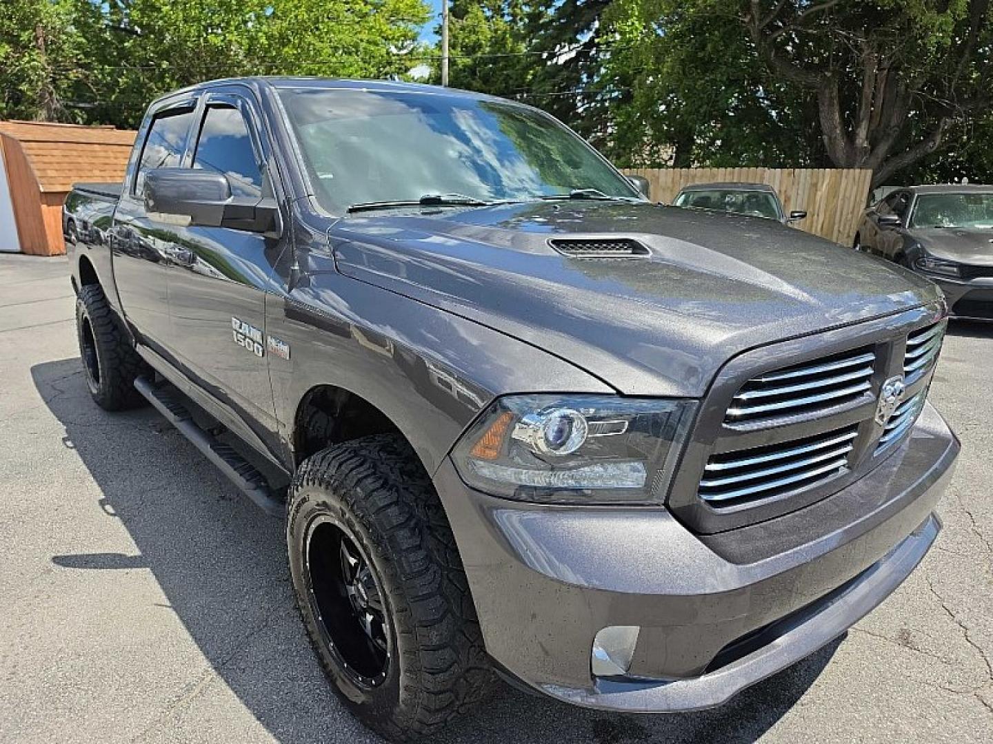 2016 GRAY /BLACK RAM 1500 Sport Crew Cab SWB 4WD (1C6RR7MT8GS) with an 5.7L V8 OHV 16V engine, 6A transmission, located at 3304 Woodville Road, Northwood, OH, 43619, (419) 210-8019, 41.612694, -83.480743 - Your #1 Destination for Auto Loans and mdash;No Matter Your Credit!At our dealership, we believe everyone deserves the opportunity to drive their dream car and mdash;whether you have good credit, bad credit, or no credit at all. With a wide selection of hundreds of cars, trucks, and SUVs, you'll fin- Photo#6