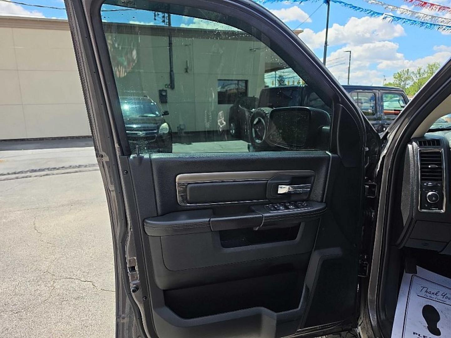 2016 GRAY /BLACK RAM 1500 Sport Crew Cab SWB 4WD (1C6RR7MT8GS) with an 5.7L V8 OHV 16V engine, 6A transmission, located at 3304 Woodville Road, Northwood, OH, 43619, (419) 210-8019, 41.612694, -83.480743 - Your #1 Destination for Auto Loans and mdash;No Matter Your Credit!At our dealership, we believe everyone deserves the opportunity to drive their dream car and mdash;whether you have good credit, bad credit, or no credit at all. With a wide selection of hundreds of cars, trucks, and SUVs, you'll fin- Photo#8