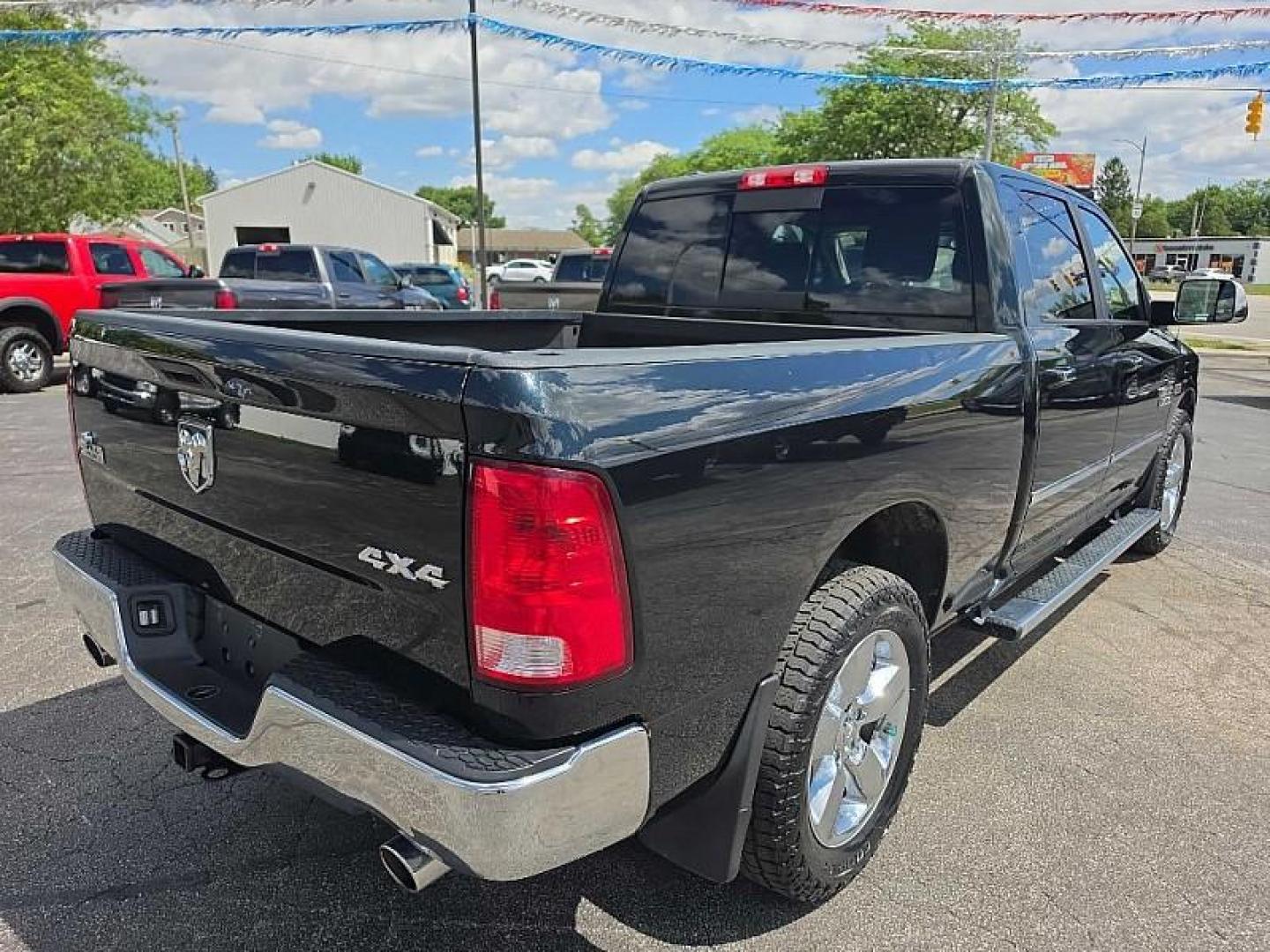 2017 GREEN RAM 1500 SLT Crew Cab LWB 4WD (1C6RR7TT3HS) with an 5.7L V8 OHV 16V engine, 8A transmission, located at 3304 Woodville Road, Northwood, OH, 43619, (419) 210-8019, 41.612694, -83.480743 - Your #1 Destination for Auto Loans and mdash;No Matter Your Credit!At our dealership, we believe everyone deserves the opportunity to drive their dream car and mdash;whether you have good credit, bad credit, or no credit at all. With a wide selection of hundreds of cars, trucks, and SUVs, you'll fin - Photo#4
