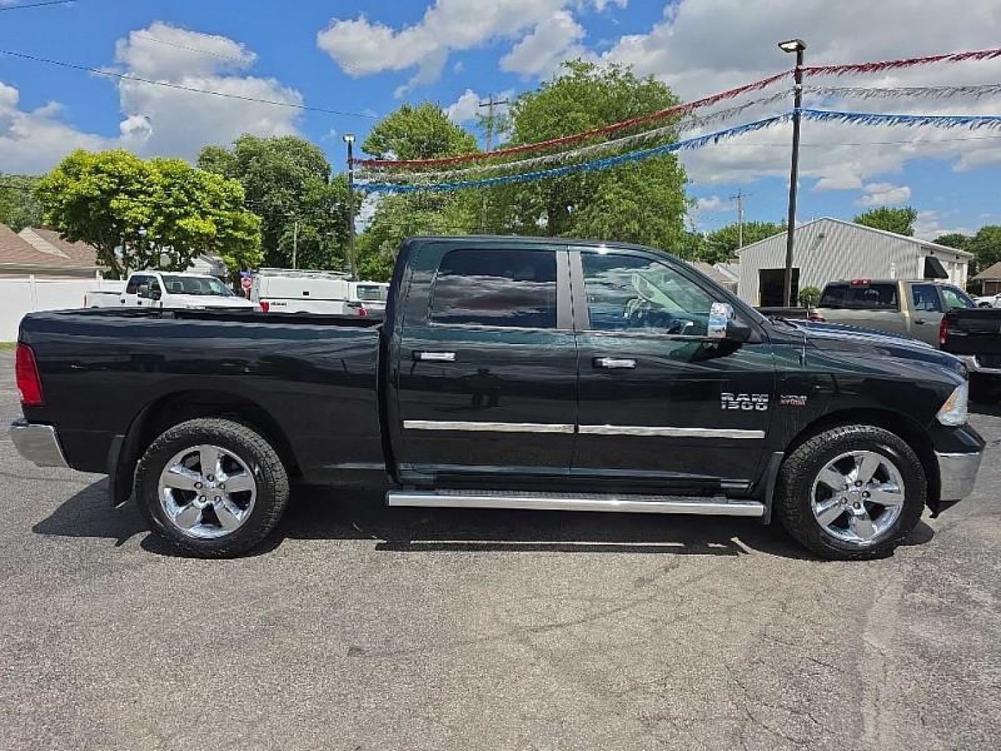 2017 GREEN RAM 1500 SLT Crew Cab LWB 4WD (1C6RR7TT3HS) with an 5.7L V8 OHV 16V engine, 8A transmission, located at 3304 Woodville Road, Northwood, OH, 43619, (419) 210-8019, 41.612694, -83.480743 - Your #1 Destination for Auto Loans and mdash;No Matter Your Credit!At our dealership, we believe everyone deserves the opportunity to drive their dream car and mdash;whether you have good credit, bad credit, or no credit at all. With a wide selection of hundreds of cars, trucks, and SUVs, you'll fin - Photo#5