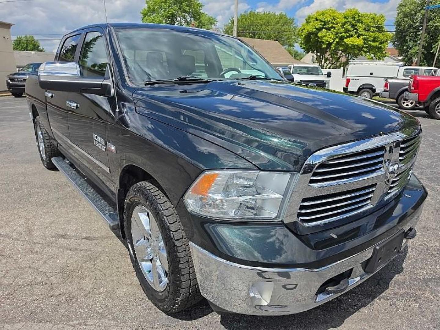 2017 GREEN RAM 1500 SLT Crew Cab LWB 4WD (1C6RR7TT3HS) with an 5.7L V8 OHV 16V engine, 8A transmission, located at 3304 Woodville Road, Northwood, OH, 43619, (419) 210-8019, 41.612694, -83.480743 - Your #1 Destination for Auto Loans and mdash;No Matter Your Credit!At our dealership, we believe everyone deserves the opportunity to drive their dream car and mdash;whether you have good credit, bad credit, or no credit at all. With a wide selection of hundreds of cars, trucks, and SUVs, you'll fin - Photo#6