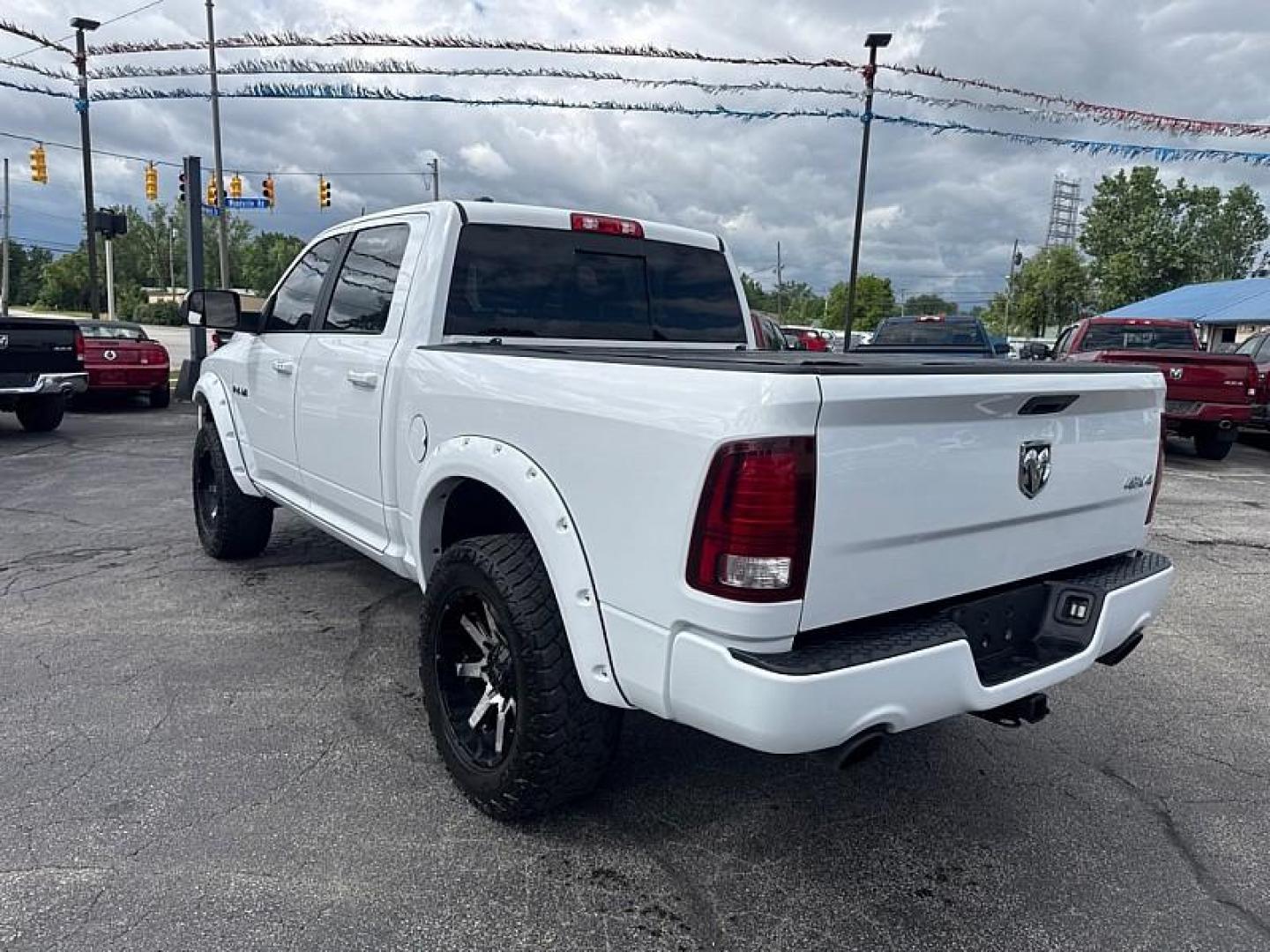 2017 WHITE /BLACK RAM 1500 Sport Crew Cab SWB 4WD (1C6RR7MT3HS) with an 5.7L V8 OHV 16V engine, 8A transmission, located at 3304 Woodville Road, Northwood, OH, 43619, (419) 210-8019, 41.612694, -83.480743 - Your #1 Destination for Auto Loans and mdash;No Matter Your Credit!At our dealership, we believe everyone deserves the opportunity to drive their dream car and mdash;whether you have good credit, bad credit, or no credit at all. With a wide selection of hundreds of cars, trucks, and SUVs, you'll fin- Photo#2