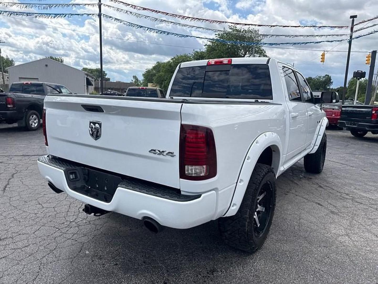 2017 WHITE /BLACK RAM 1500 Sport Crew Cab SWB 4WD (1C6RR7MT3HS) with an 5.7L V8 OHV 16V engine, 8A transmission, located at 3304 Woodville Road, Northwood, OH, 43619, (419) 210-8019, 41.612694, -83.480743 - Your #1 Destination for Auto Loans and mdash;No Matter Your Credit!At our dealership, we believe everyone deserves the opportunity to drive their dream car and mdash;whether you have good credit, bad credit, or no credit at all. With a wide selection of hundreds of cars, trucks, and SUVs, you'll fin- Photo#4