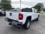 2016 WHITE /BROWN/TAN GMC Sierra 2500HD SLT Double Cab 4WD (1GT22TE86GZ) with an 6.6L V8 OHV 16V DIESEL engine, 6A transmission, located at 3304 Woodville Road, Northwood, OH, 43619, (419) 210-8019, 41.612694, -83.480743 - Your #1 Destination for Auto Loans and mdash;No Matter Your Credit!At our dealership, we believe everyone deserves the opportunity to drive their dream car and mdash;whether you have good credit, bad credit, or no credit at all. With a wide selection of hundreds of cars, trucks, and SUVs, you'll fin- Photo#4