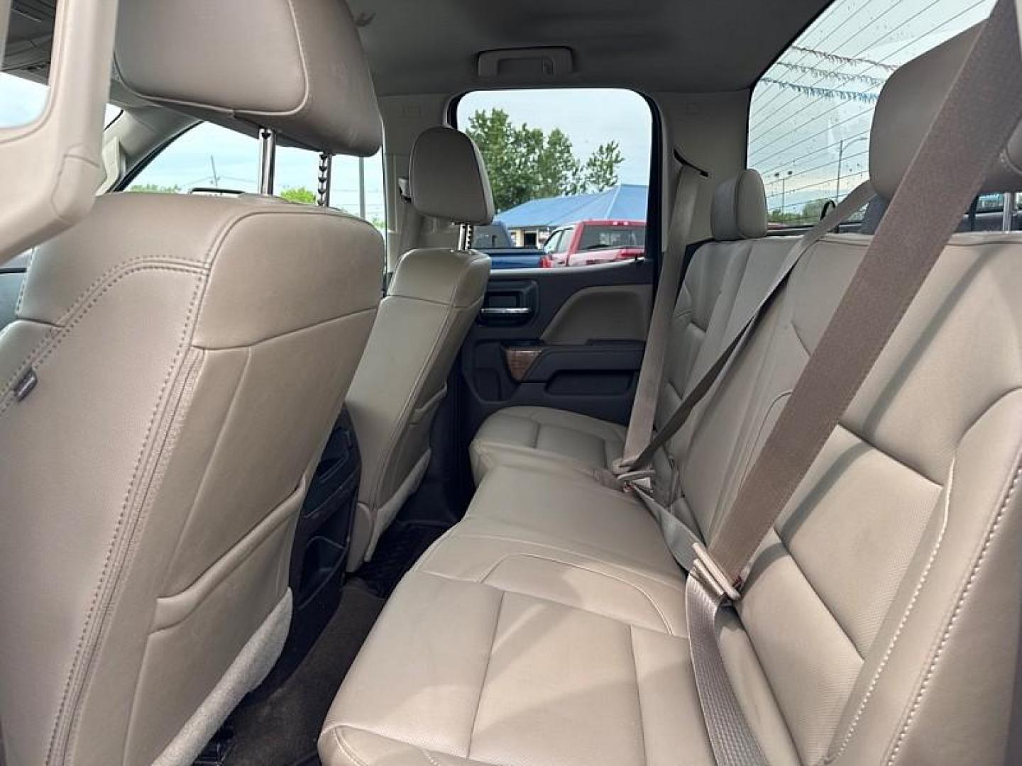 2016 WHITE /BROWN/TAN GMC Sierra 2500HD SLT Double Cab 4WD (1GT22TE86GZ) with an 6.6L V8 OHV 16V DIESEL engine, 6A transmission, located at 3304 Woodville Road, Northwood, OH, 43619, (419) 210-8019, 41.612694, -83.480743 - Your #1 Destination for Auto Loans and mdash;No Matter Your Credit!At our dealership, we believe everyone deserves the opportunity to drive their dream car and mdash;whether you have good credit, bad credit, or no credit at all. With a wide selection of hundreds of cars, trucks, and SUVs, you'll fin- Photo#12