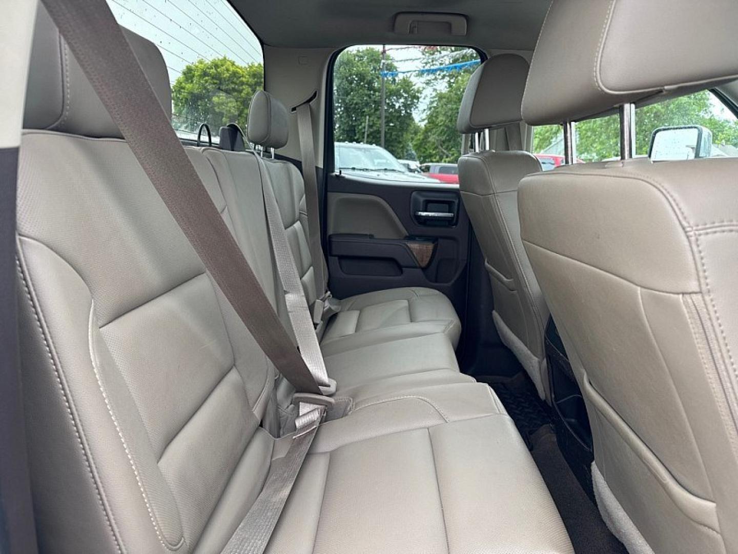 2016 WHITE /BROWN/TAN GMC Sierra 2500HD SLT Double Cab 4WD (1GT22TE86GZ) with an 6.6L V8 OHV 16V DIESEL engine, 6A transmission, located at 3304 Woodville Road, Northwood, OH, 43619, (419) 210-8019, 41.612694, -83.480743 - Your #1 Destination for Auto Loans and mdash;No Matter Your Credit!At our dealership, we believe everyone deserves the opportunity to drive their dream car and mdash;whether you have good credit, bad credit, or no credit at all. With a wide selection of hundreds of cars, trucks, and SUVs, you'll fin- Photo#14
