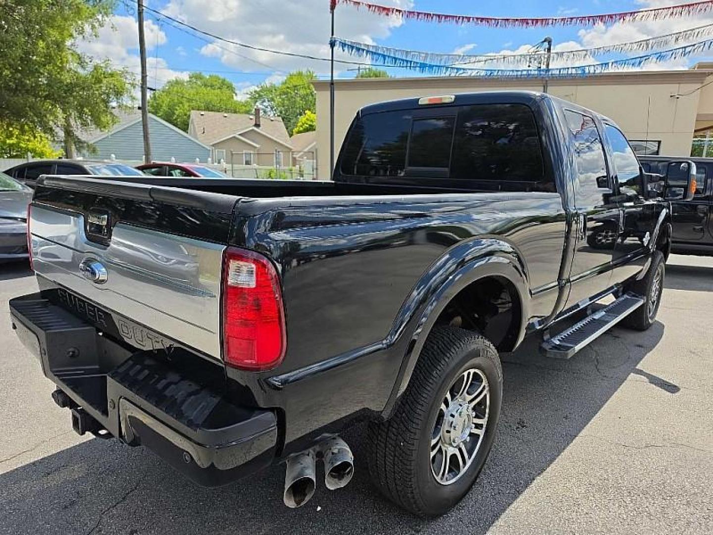 2015 BLACK /BLACK Ford F-350 SD King Ranch Crew Cab 4WD (1FT8W3BT6FE) with an 6.7L V8 OHV 16V DIESEL engine, 6-Speed Automatic transmission, located at 3304 Woodville Road, Northwood, OH, 43619, (419) 210-8019, 41.612694, -83.480743 - Your #1 Destination for Auto Loans and mdash;No Matter Your Credit!At our dealership, we believe everyone deserves the opportunity to drive their dream car and mdash;whether you have good credit, bad credit, or no credit at all. With a wide selection of hundreds of cars, trucks, and SUVs, you'll fin- Photo#4
