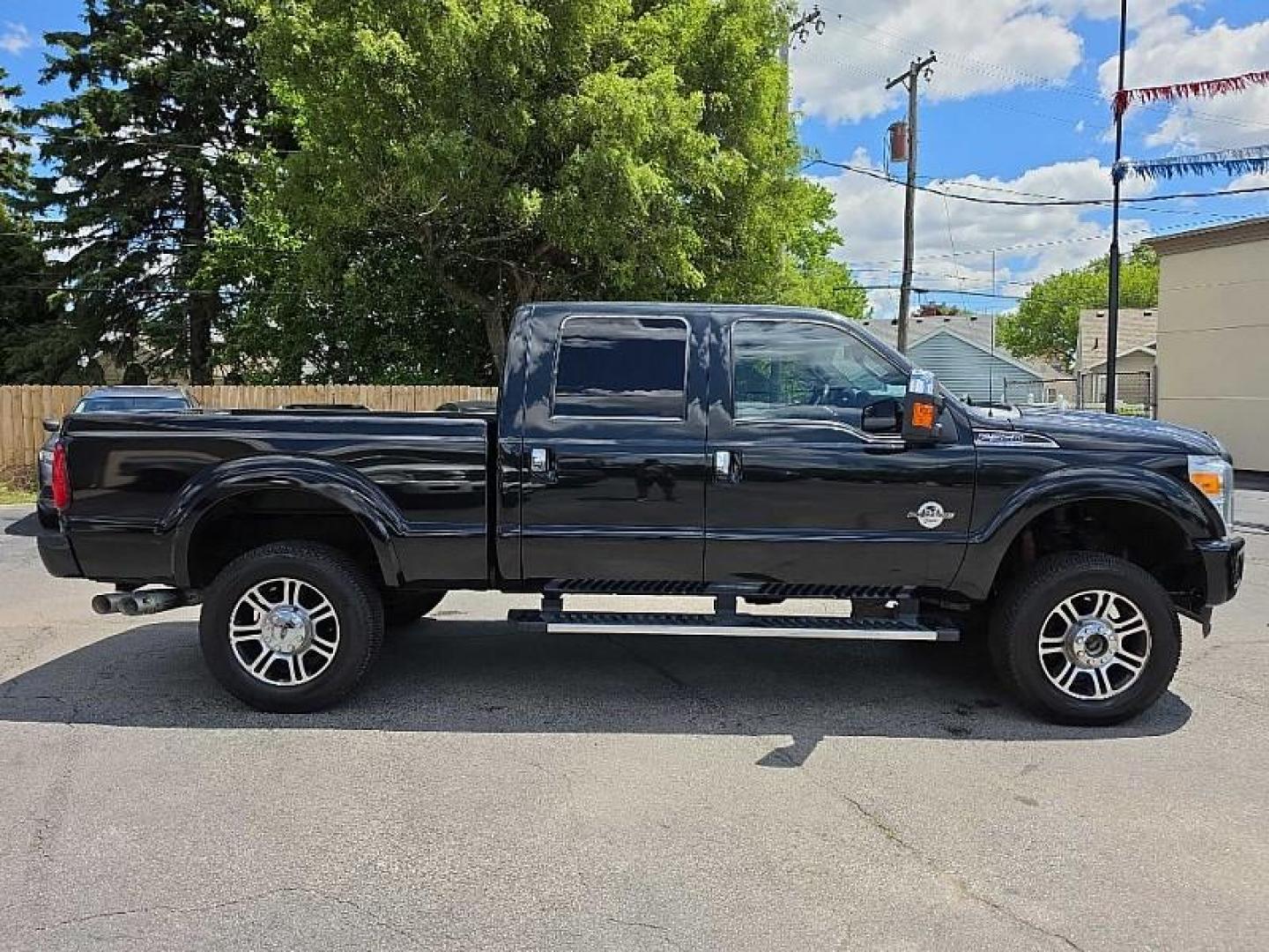 2015 BLACK /BLACK Ford F-350 SD King Ranch Crew Cab 4WD (1FT8W3BT6FE) with an 6.7L V8 OHV 16V DIESEL engine, 6-Speed Automatic transmission, located at 3304 Woodville Road, Northwood, OH, 43619, (419) 210-8019, 41.612694, -83.480743 - Your #1 Destination for Auto Loans and mdash;No Matter Your Credit!At our dealership, we believe everyone deserves the opportunity to drive their dream car and mdash;whether you have good credit, bad credit, or no credit at all. With a wide selection of hundreds of cars, trucks, and SUVs, you'll fin- Photo#5