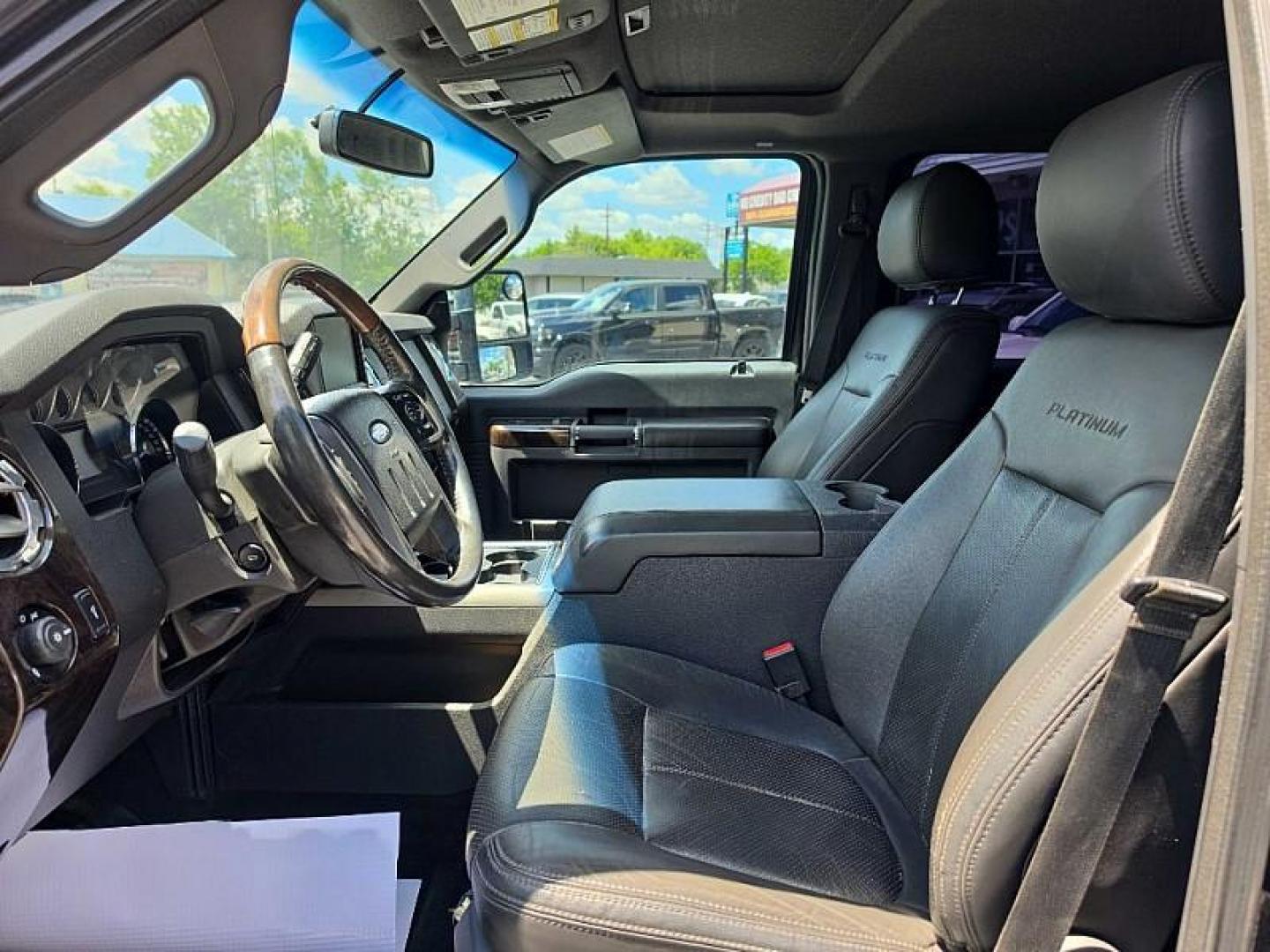 2015 BLACK /BLACK Ford F-350 SD King Ranch Crew Cab 4WD (1FT8W3BT6FE) with an 6.7L V8 OHV 16V DIESEL engine, 6-Speed Automatic transmission, located at 3304 Woodville Road, Northwood, OH, 43619, (419) 210-8019, 41.612694, -83.480743 - Your #1 Destination for Auto Loans and mdash;No Matter Your Credit!At our dealership, we believe everyone deserves the opportunity to drive their dream car and mdash;whether you have good credit, bad credit, or no credit at all. With a wide selection of hundreds of cars, trucks, and SUVs, you'll fin- Photo#9
