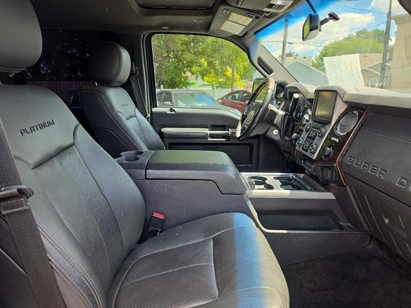 2015 BLACK /BLACK Ford F-350 SD King Ranch Crew Cab 4WD (1FT8W3BT6FE) with an 6.7L V8 OHV 16V DIESEL engine, 6-Speed Automatic transmission, located at 3304 Woodville Road, Northwood, OH, 43619, (419) 210-8019, 41.612694, -83.480743 - Your #1 Destination for Auto Loans and mdash;No Matter Your Credit!At our dealership, we believe everyone deserves the opportunity to drive their dream car and mdash;whether you have good credit, bad credit, or no credit at all. With a wide selection of hundreds of cars, trucks, and SUVs, you'll fin- Photo#16