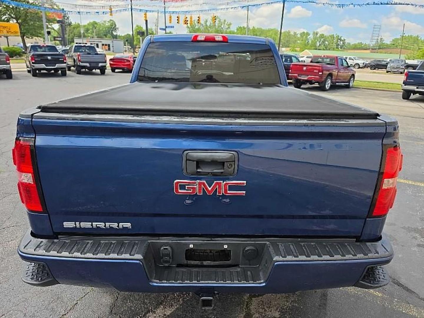 2016 BLUE /BLACK GMC Sierra 1500 Base Double Cab 4WD (1GTV2LEC7GZ) with an 5.3L V8 OHV 16V engine, 6A transmission, located at 3304 Woodville Road, Northwood, OH, 43619, (419) 210-8019, 41.612694, -83.480743 - Your #1 Destination for Auto Loans and mdash;No Matter Your Credit!At our dealership, we believe everyone deserves the opportunity to drive their dream car and mdash;whether you have good credit, bad credit, or no credit at all. With a wide selection of hundreds of cars, trucks, and SUVs, you'll fin - Photo#3