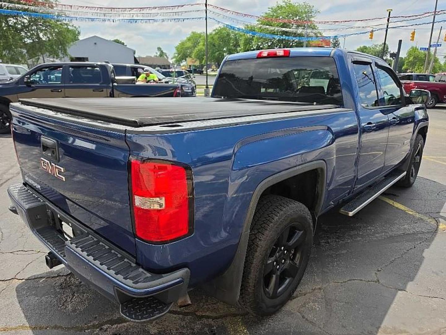 2016 BLUE /BLACK GMC Sierra 1500 Base Double Cab 4WD (1GTV2LEC7GZ) with an 5.3L V8 OHV 16V engine, 6A transmission, located at 3304 Woodville Road, Northwood, OH, 43619, (419) 210-8019, 41.612694, -83.480743 - Your #1 Destination for Auto Loans and mdash;No Matter Your Credit!At our dealership, we believe everyone deserves the opportunity to drive their dream car and mdash;whether you have good credit, bad credit, or no credit at all. With a wide selection of hundreds of cars, trucks, and SUVs, you'll fin - Photo#4