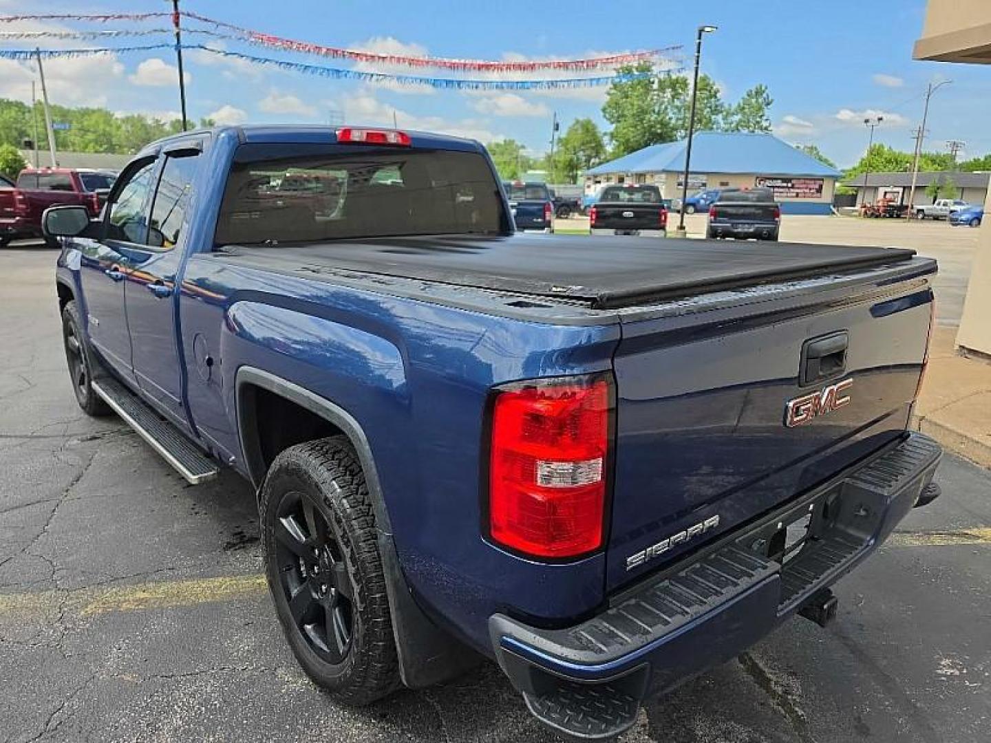 2016 BLUE /BLACK GMC Sierra 1500 Base Double Cab 4WD (1GTV2LEC7GZ) with an 5.3L V8 OHV 16V engine, 6A transmission, located at 3304 Woodville Road, Northwood, OH, 43619, (419) 210-8019, 41.612694, -83.480743 - Your #1 Destination for Auto Loans and mdash;No Matter Your Credit!At our dealership, we believe everyone deserves the opportunity to drive their dream car and mdash;whether you have good credit, bad credit, or no credit at all. With a wide selection of hundreds of cars, trucks, and SUVs, you'll fin - Photo#2