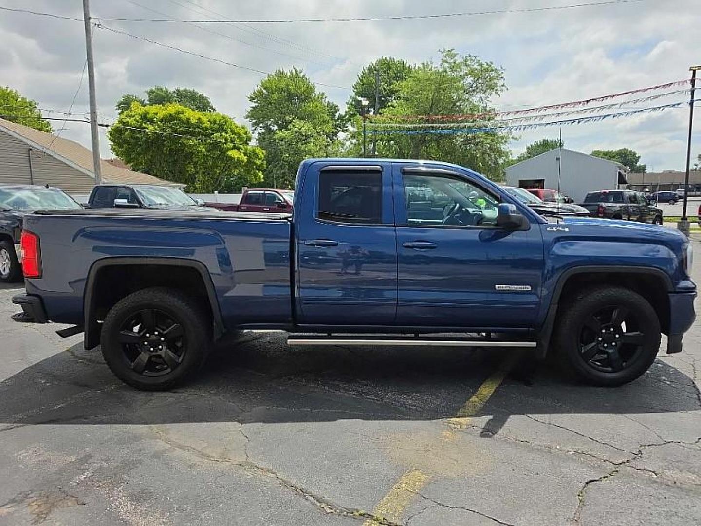 2016 BLUE /BLACK GMC Sierra 1500 Base Double Cab 4WD (1GTV2LEC7GZ) with an 5.3L V8 OHV 16V engine, 6A transmission, located at 3304 Woodville Road, Northwood, OH, 43619, (419) 210-8019, 41.612694, -83.480743 - Your #1 Destination for Auto Loans and mdash;No Matter Your Credit!At our dealership, we believe everyone deserves the opportunity to drive their dream car and mdash;whether you have good credit, bad credit, or no credit at all. With a wide selection of hundreds of cars, trucks, and SUVs, you'll fin - Photo#5