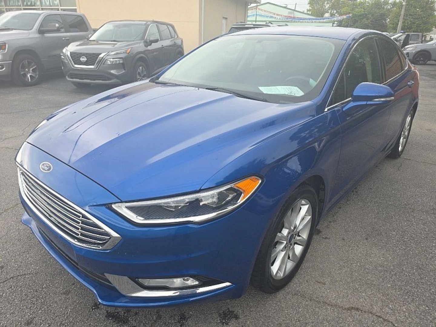 2017 BLUE /BLACK Ford Fusion SE (3FA6P0HD0HR) with an 1.5L L4 DOHC 16V engine, 6A transmission, located at 3304 Woodville Road, Northwood, OH, 43619, (419) 210-8019, 41.612694, -83.480743 - Your #1 Destination for Auto Loans and mdash;No Matter Your Credit!At our dealership, we believe everyone deserves the opportunity to drive their dream car and mdash;whether you have good credit, bad credit, or no credit at all. With a wide selection of hundreds of cars, trucks, and SUVs, you'll fin- Photo#0