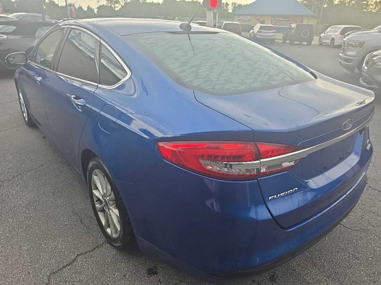 2017 BLUE /BLACK Ford Fusion SE (3FA6P0HD0HR) with an 1.5L L4 DOHC 16V engine, 6A transmission, located at 3304 Woodville Road, Northwood, OH, 43619, (419) 210-8019, 41.612694, -83.480743 - Your #1 Destination for Auto Loans and mdash;No Matter Your Credit!At our dealership, we believe everyone deserves the opportunity to drive their dream car and mdash;whether you have good credit, bad credit, or no credit at all. With a wide selection of hundreds of cars, trucks, and SUVs, you'll fin- Photo#2