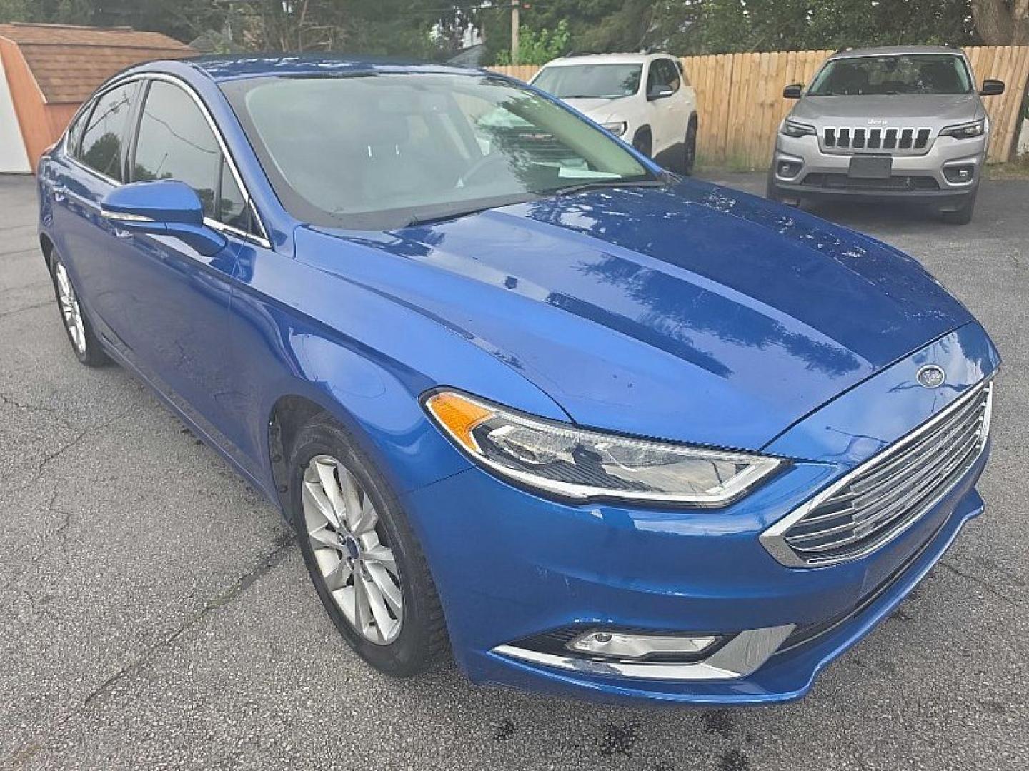2017 BLUE /BLACK Ford Fusion SE (3FA6P0HD0HR) with an 1.5L L4 DOHC 16V engine, 6A transmission, located at 3304 Woodville Road, Northwood, OH, 43619, (419) 210-8019, 41.612694, -83.480743 - Your #1 Destination for Auto Loans and mdash;No Matter Your Credit!At our dealership, we believe everyone deserves the opportunity to drive their dream car and mdash;whether you have good credit, bad credit, or no credit at all. With a wide selection of hundreds of cars, trucks, and SUVs, you'll fin- Photo#6