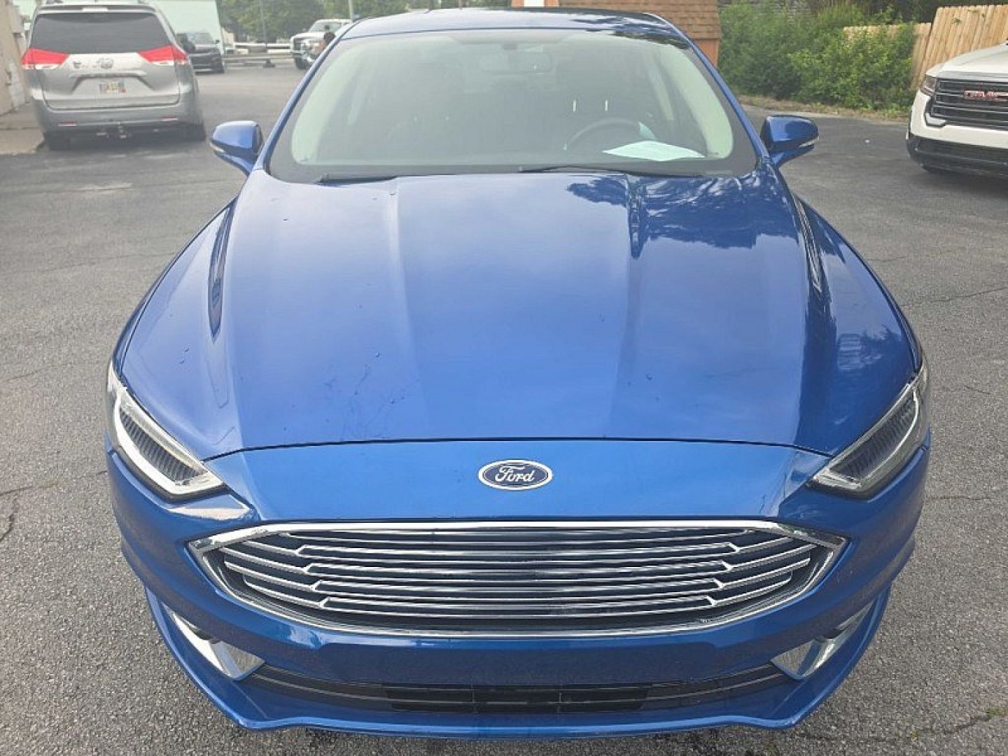 2017 BLUE /BLACK Ford Fusion SE (3FA6P0HD0HR) with an 1.5L L4 DOHC 16V engine, 6A transmission, located at 3304 Woodville Road, Northwood, OH, 43619, (419) 210-8019, 41.612694, -83.480743 - Your #1 Destination for Auto Loans and mdash;No Matter Your Credit!At our dealership, we believe everyone deserves the opportunity to drive their dream car and mdash;whether you have good credit, bad credit, or no credit at all. With a wide selection of hundreds of cars, trucks, and SUVs, you'll fin- Photo#7