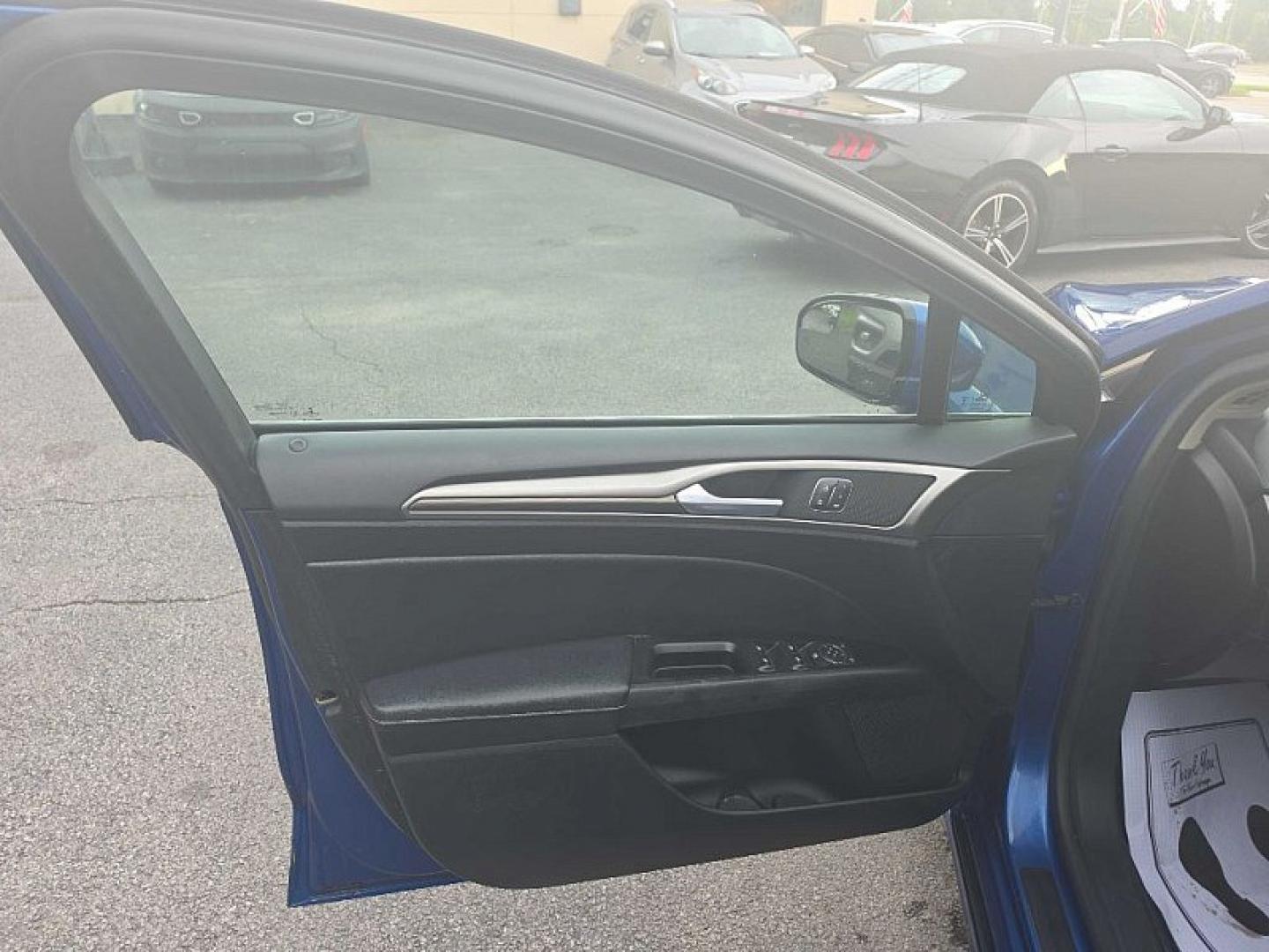 2017 BLUE /BLACK Ford Fusion SE (3FA6P0HD0HR) with an 1.5L L4 DOHC 16V engine, 6A transmission, located at 3304 Woodville Road, Northwood, OH, 43619, (419) 210-8019, 41.612694, -83.480743 - Your #1 Destination for Auto Loans and mdash;No Matter Your Credit!At our dealership, we believe everyone deserves the opportunity to drive their dream car and mdash;whether you have good credit, bad credit, or no credit at all. With a wide selection of hundreds of cars, trucks, and SUVs, you'll fin- Photo#8