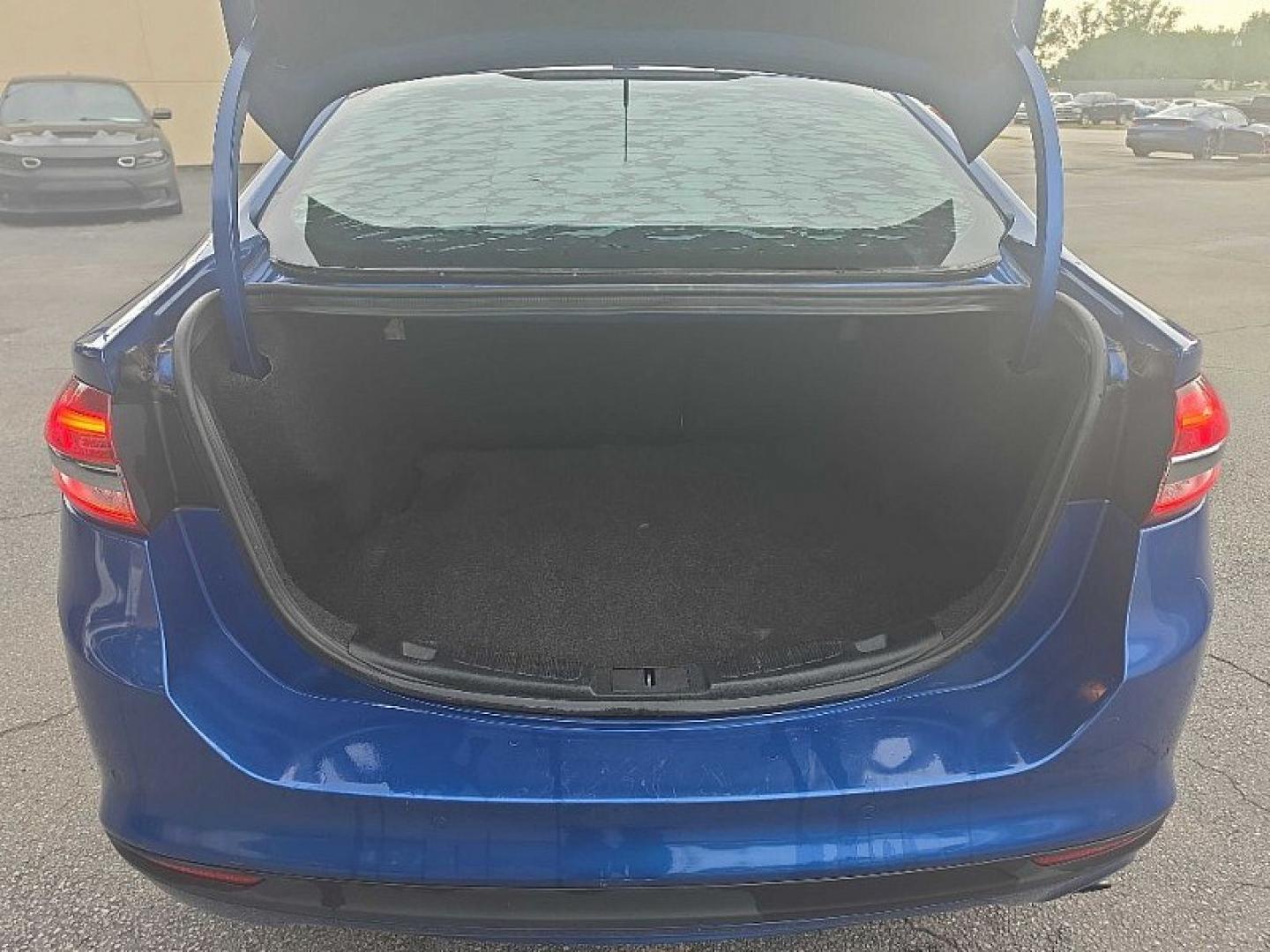2017 BLUE /BLACK Ford Fusion SE (3FA6P0HD0HR) with an 1.5L L4 DOHC 16V engine, 6A transmission, located at 3304 Woodville Road, Northwood, OH, 43619, (419) 210-8019, 41.612694, -83.480743 - Your #1 Destination for Auto Loans and mdash;No Matter Your Credit!At our dealership, we believe everyone deserves the opportunity to drive their dream car and mdash;whether you have good credit, bad credit, or no credit at all. With a wide selection of hundreds of cars, trucks, and SUVs, you'll fin- Photo#12