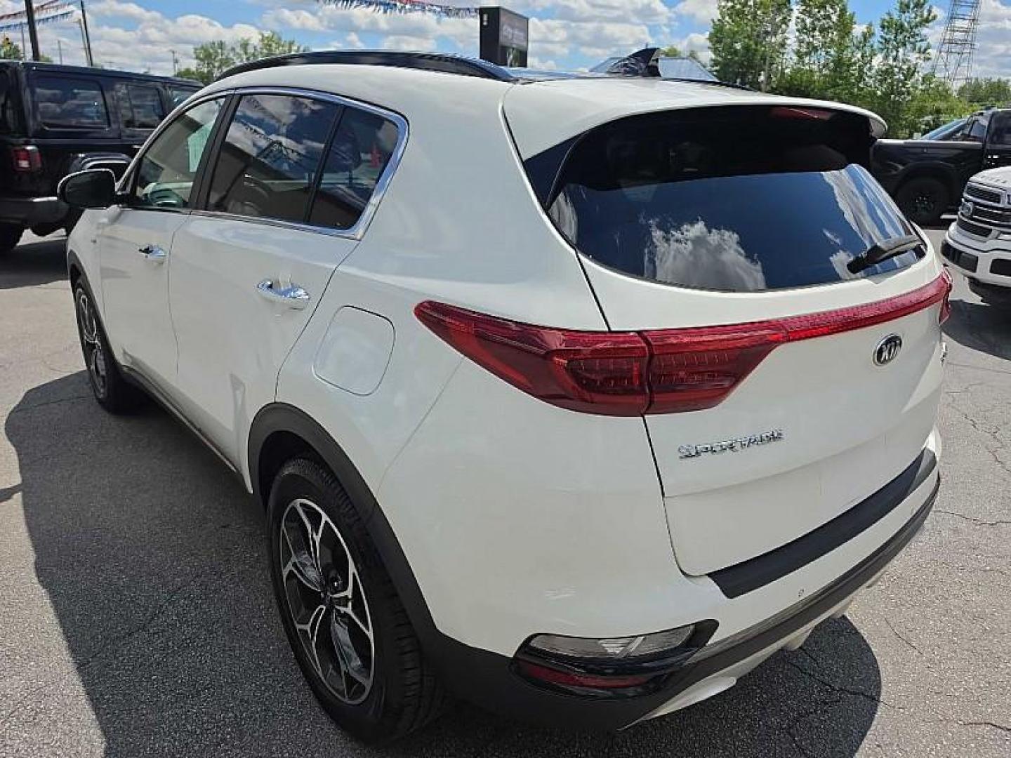 2020 WHITE /TAN Kia Sportage SX AWD (KNDPRCA63L7) with an 2.0L L4 DOHC 16V engine, 6A transmission, located at 3304 Woodville Road, Northwood, OH, 43619, (419) 210-8019, 41.612694, -83.480743 - Your #1 Destination for Auto Loans and mdash;No Matter Your Credit!At our dealership, we believe everyone deserves the opportunity to drive their dream car and mdash;whether you have good credit, bad credit, or no credit at all. With a wide selection of hundreds of cars, trucks, and SUVs, you'll fin- Photo#2