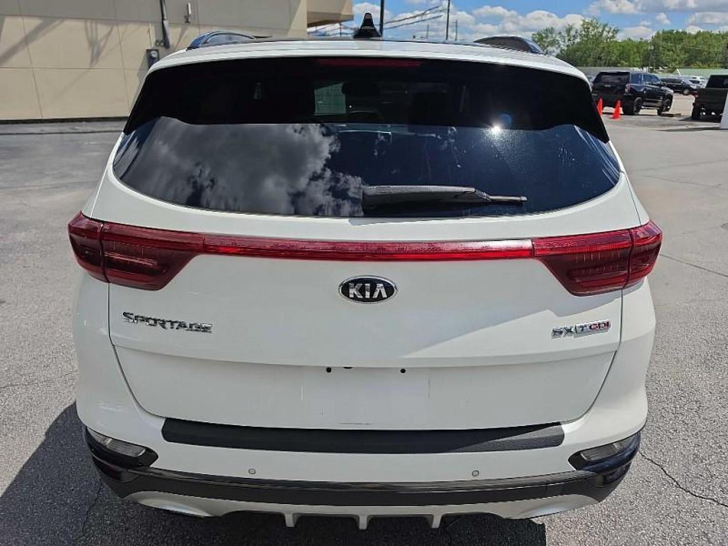 2020 WHITE /TAN Kia Sportage SX AWD (KNDPRCA63L7) with an 2.0L L4 DOHC 16V engine, 6A transmission, located at 3304 Woodville Road, Northwood, OH, 43619, (419) 210-8019, 41.612694, -83.480743 - Your #1 Destination for Auto Loans and mdash;No Matter Your Credit!At our dealership, we believe everyone deserves the opportunity to drive their dream car and mdash;whether you have good credit, bad credit, or no credit at all. With a wide selection of hundreds of cars, trucks, and SUVs, you'll fin- Photo#3