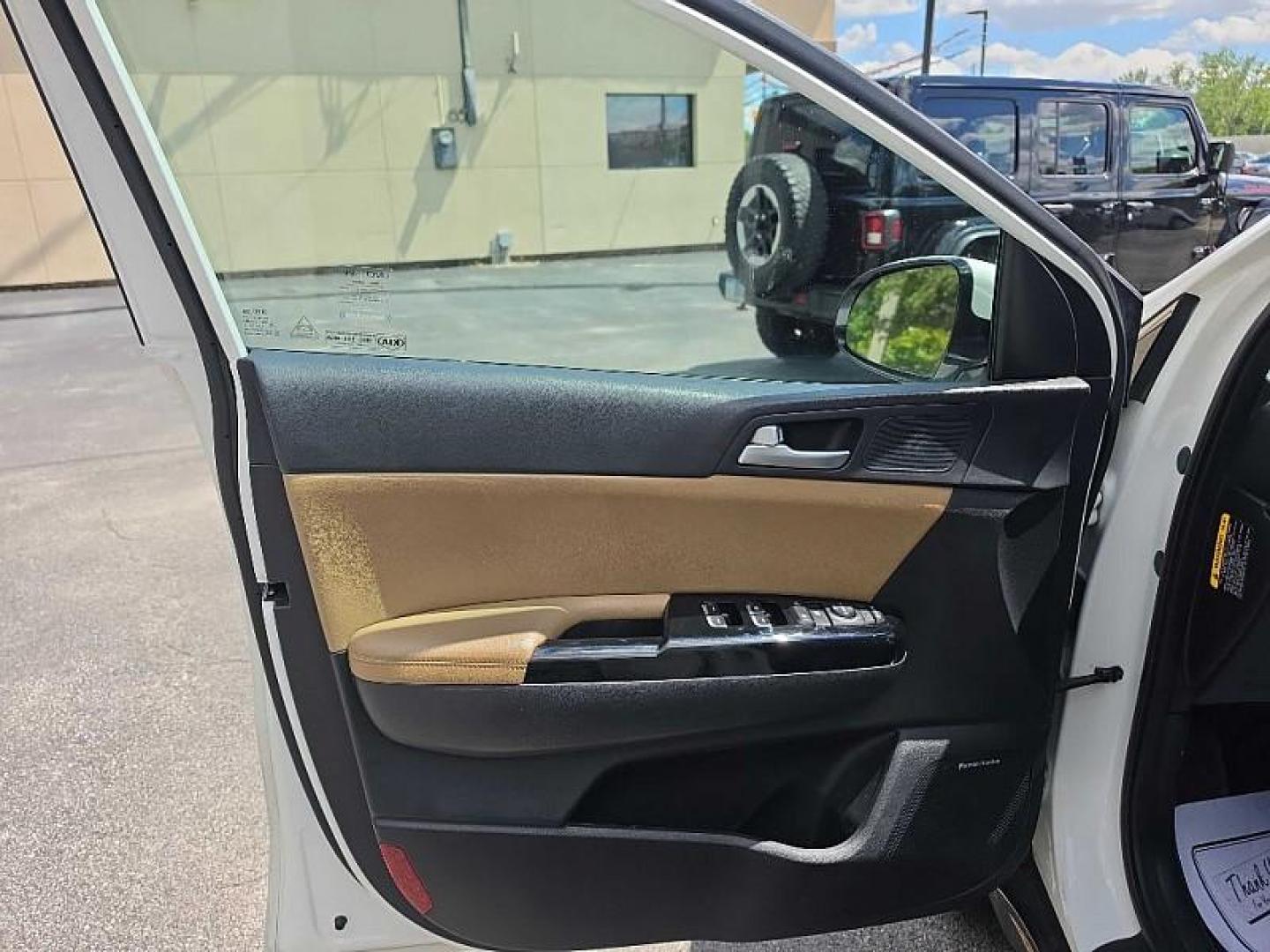 2020 WHITE /TAN Kia Sportage SX AWD (KNDPRCA63L7) with an 2.0L L4 DOHC 16V engine, 6A transmission, located at 3304 Woodville Road, Northwood, OH, 43619, (419) 210-8019, 41.612694, -83.480743 - Your #1 Destination for Auto Loans and mdash;No Matter Your Credit!At our dealership, we believe everyone deserves the opportunity to drive their dream car and mdash;whether you have good credit, bad credit, or no credit at all. With a wide selection of hundreds of cars, trucks, and SUVs, you'll fin- Photo#8