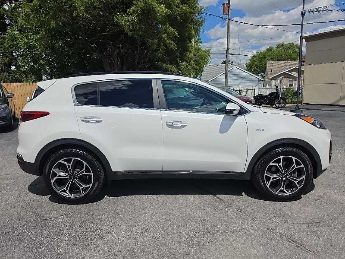 2020 WHITE /TAN Kia Sportage SX AWD (KNDPRCA63L7) with an 2.0L L4 DOHC 16V engine, 6A transmission, located at 3304 Woodville Road, Northwood, OH, 43619, (419) 210-8019, 41.612694, -83.480743 - Your #1 Destination for Auto Loans and mdash;No Matter Your Credit!At our dealership, we believe everyone deserves the opportunity to drive their dream car and mdash;whether you have good credit, bad credit, or no credit at all. With a wide selection of hundreds of cars, trucks, and SUVs, you'll fin- Photo#5
