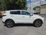 2020 WHITE /TAN Kia Sportage SX AWD (KNDPRCA63L7) with an 2.0L L4 DOHC 16V engine, 6A transmission, located at 3304 Woodville Road, Northwood, OH, 43619, (419) 210-8019, 41.612694, -83.480743 - Your #1 Destination for Auto Loans and mdash;No Matter Your Credit!At our dealership, we believe everyone deserves the opportunity to drive their dream car and mdash;whether you have good credit, bad credit, or no credit at all. With a wide selection of hundreds of cars, trucks, and SUVs, you'll fin- Photo#5