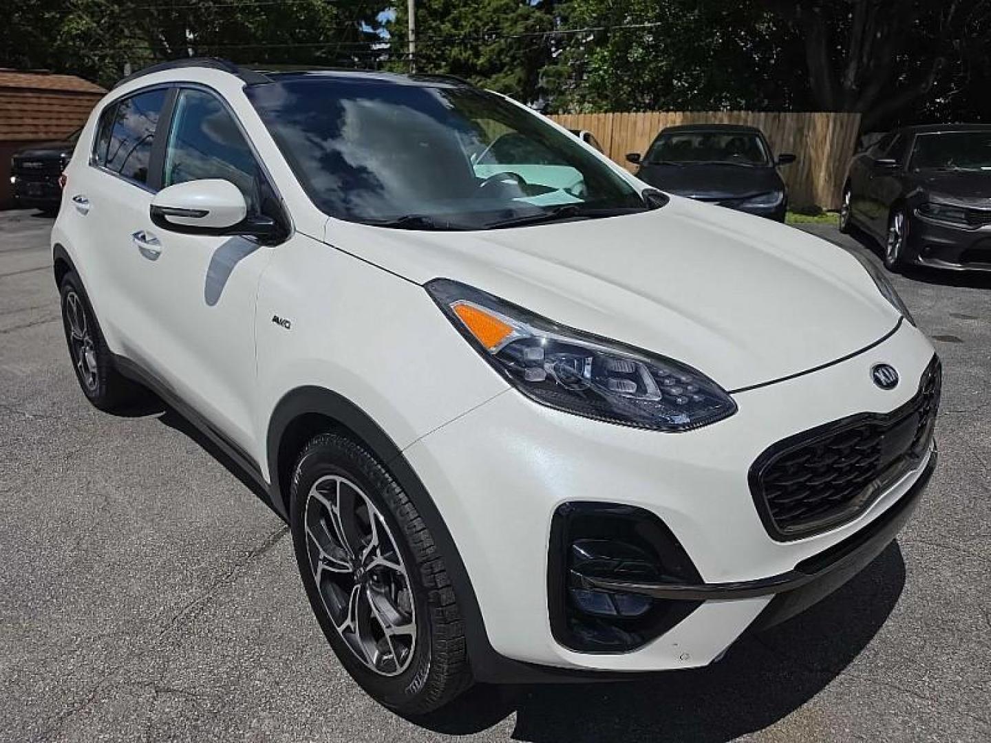 2020 WHITE /TAN Kia Sportage SX AWD (KNDPRCA63L7) with an 2.0L L4 DOHC 16V engine, 6A transmission, located at 3304 Woodville Road, Northwood, OH, 43619, (419) 210-8019, 41.612694, -83.480743 - Your #1 Destination for Auto Loans and mdash;No Matter Your Credit!At our dealership, we believe everyone deserves the opportunity to drive their dream car and mdash;whether you have good credit, bad credit, or no credit at all. With a wide selection of hundreds of cars, trucks, and SUVs, you'll fin- Photo#6