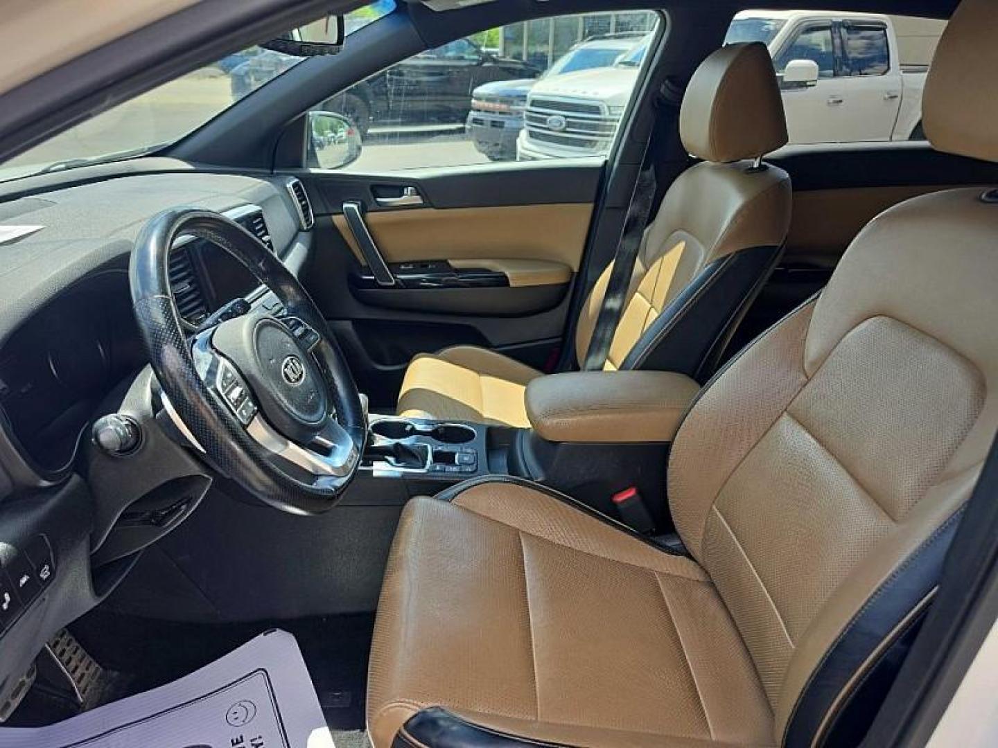 2020 WHITE /TAN Kia Sportage SX AWD (KNDPRCA63L7) with an 2.0L L4 DOHC 16V engine, 6A transmission, located at 3304 Woodville Road, Northwood, OH, 43619, (419) 210-8019, 41.612694, -83.480743 - Your #1 Destination for Auto Loans and mdash;No Matter Your Credit!At our dealership, we believe everyone deserves the opportunity to drive their dream car and mdash;whether you have good credit, bad credit, or no credit at all. With a wide selection of hundreds of cars, trucks, and SUVs, you'll fin- Photo#9