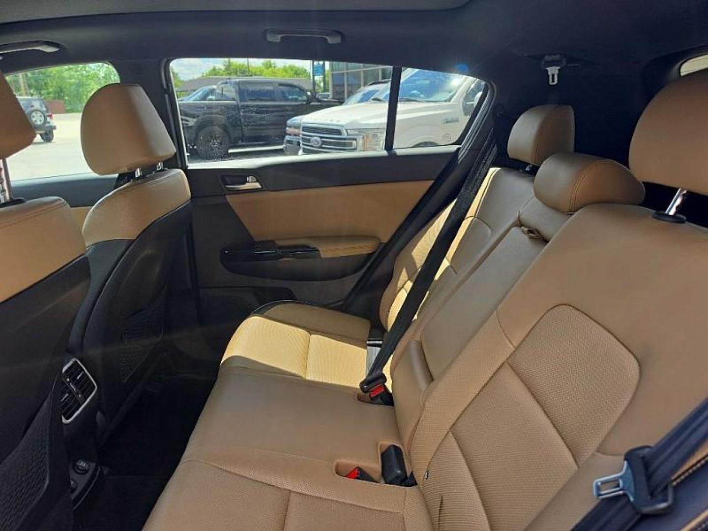 2020 WHITE /TAN Kia Sportage SX AWD (KNDPRCA63L7) with an 2.0L L4 DOHC 16V engine, 6A transmission, located at 3304 Woodville Road, Northwood, OH, 43619, (419) 210-8019, 41.612694, -83.480743 - Your #1 Destination for Auto Loans and mdash;No Matter Your Credit!At our dealership, we believe everyone deserves the opportunity to drive their dream car and mdash;whether you have good credit, bad credit, or no credit at all. With a wide selection of hundreds of cars, trucks, and SUVs, you'll fin- Photo#12