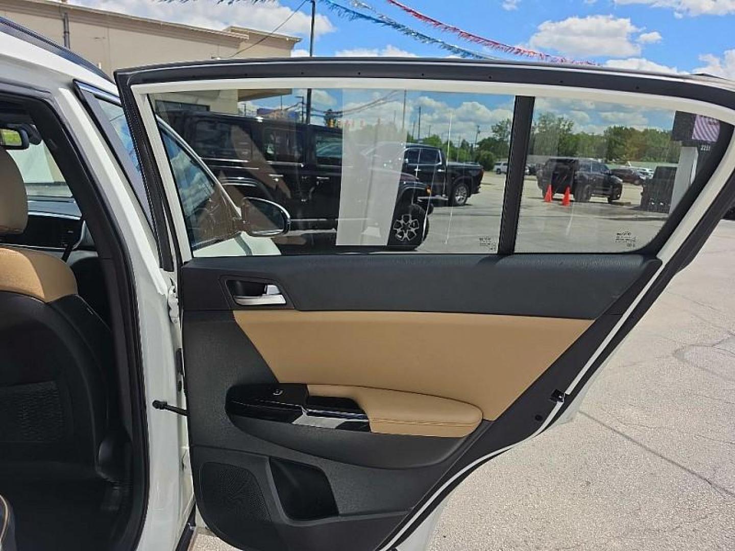 2020 WHITE /TAN Kia Sportage SX AWD (KNDPRCA63L7) with an 2.0L L4 DOHC 16V engine, 6A transmission, located at 3304 Woodville Road, Northwood, OH, 43619, (419) 210-8019, 41.612694, -83.480743 - Your #1 Destination for Auto Loans and mdash;No Matter Your Credit!At our dealership, we believe everyone deserves the opportunity to drive their dream car and mdash;whether you have good credit, bad credit, or no credit at all. With a wide selection of hundreds of cars, trucks, and SUVs, you'll fin- Photo#14