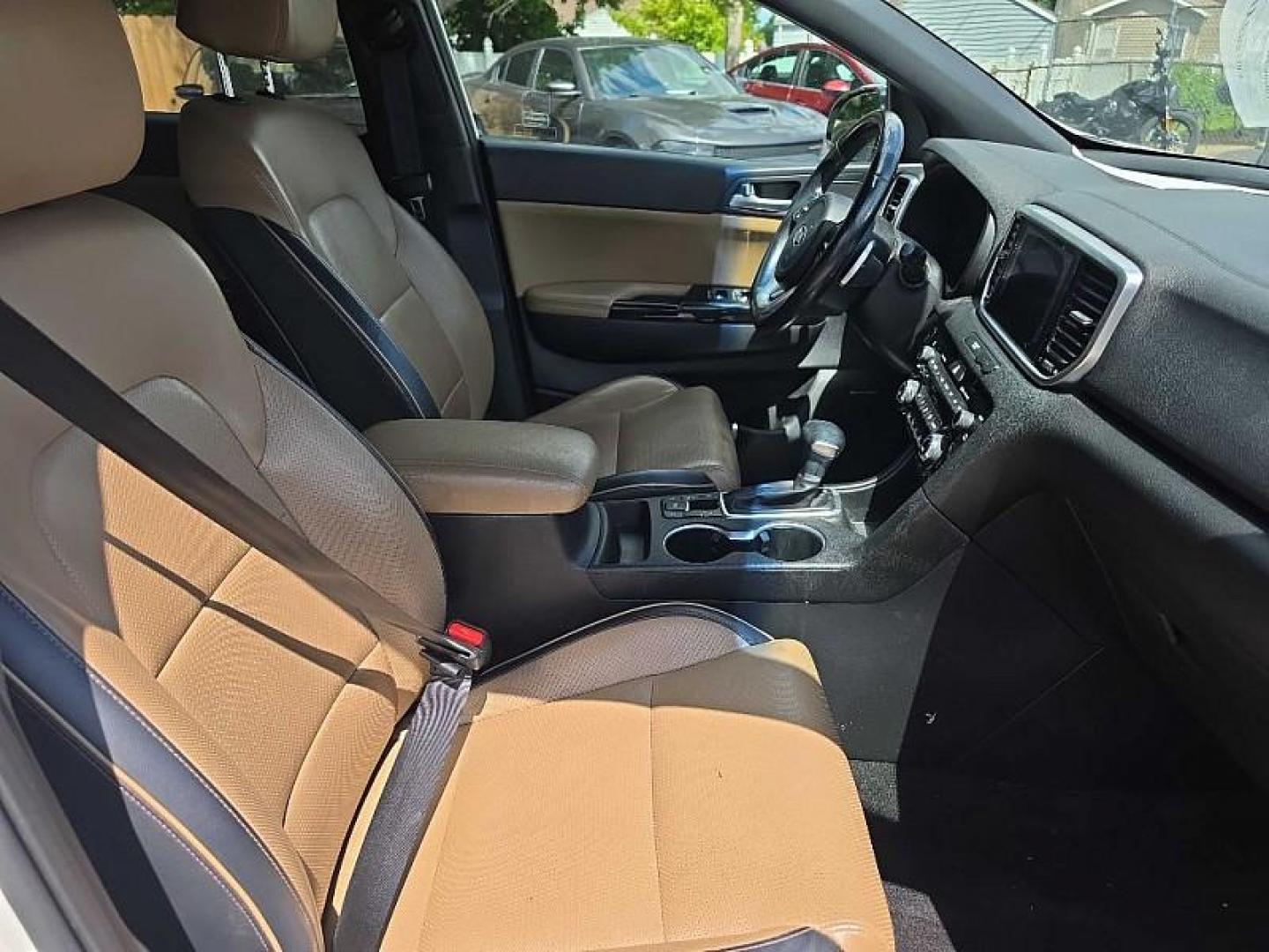 2020 WHITE /TAN Kia Sportage SX AWD (KNDPRCA63L7) with an 2.0L L4 DOHC 16V engine, 6A transmission, located at 3304 Woodville Road, Northwood, OH, 43619, (419) 210-8019, 41.612694, -83.480743 - Your #1 Destination for Auto Loans and mdash;No Matter Your Credit!At our dealership, we believe everyone deserves the opportunity to drive their dream car and mdash;whether you have good credit, bad credit, or no credit at all. With a wide selection of hundreds of cars, trucks, and SUVs, you'll fin- Photo#16