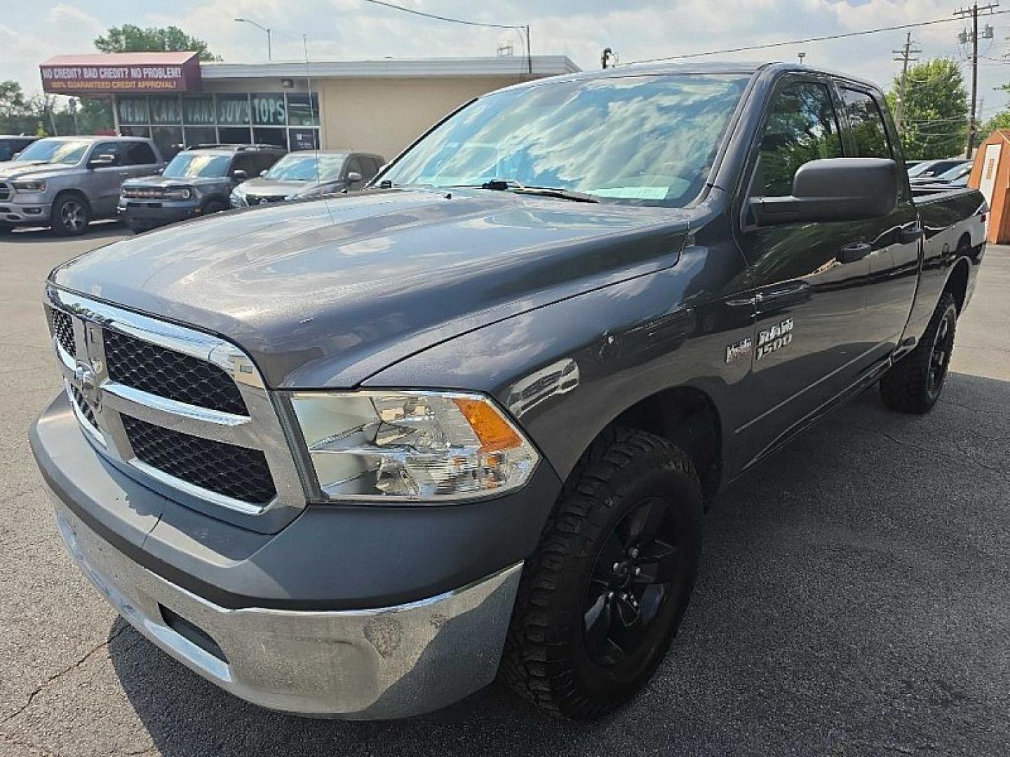 2016 GRAY /GRAY RAM 1500 Tradesman Quad Cab 4WD (1C6RR7FT9GS) with an 5.7L V8 OHV 16V engine, 6A transmission, located at 3304 Woodville Road, Northwood, OH, 43619, (419) 210-8019, 41.612694, -83.480743 - Your #1 Destination for Auto Loans and mdash;No Matter Your Credit!At our dealership, we believe everyone deserves the opportunity to drive their dream car and mdash;whether you have good credit, bad credit, or no credit at all. With a wide selection of hundreds of cars, trucks, and SUVs, you'll fin- Photo#0