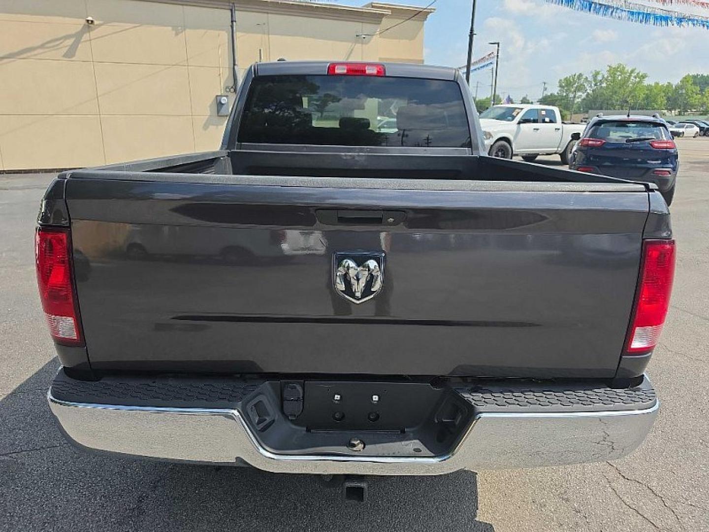 2016 GRAY /GRAY RAM 1500 Tradesman Quad Cab 4WD (1C6RR7FT9GS) with an 5.7L V8 OHV 16V engine, 6A transmission, located at 3304 Woodville Road, Northwood, OH, 43619, (419) 210-8019, 41.612694, -83.480743 - Your #1 Destination for Auto Loans and mdash;No Matter Your Credit!At our dealership, we believe everyone deserves the opportunity to drive their dream car and mdash;whether you have good credit, bad credit, or no credit at all. With a wide selection of hundreds of cars, trucks, and SUVs, you'll fin- Photo#3