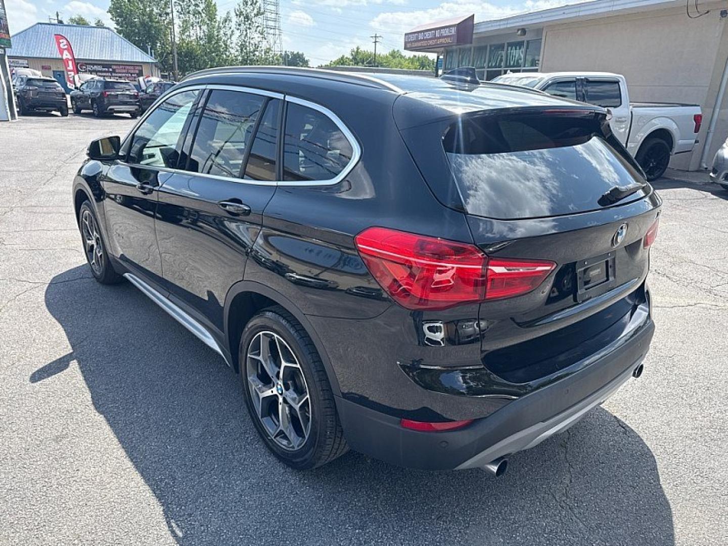 2017 BLACK /BLACK BMW X1 xDrive28i (WBXHT3Z34H4) with an 2.0L L4 DOHC 16V engine, 8A transmission, located at 3304 Woodville Road, Northwood, OH, 43619, (419) 210-8019, 41.612694, -83.480743 - Your #1 Destination for Auto Loans and mdash;No Matter Your Credit!At our dealership, we believe everyone deserves the opportunity to drive their dream car and mdash;whether you have good credit, bad credit, or no credit at all. With a wide selection of hundreds of cars, trucks, and SUVs, you'll fin- Photo#2