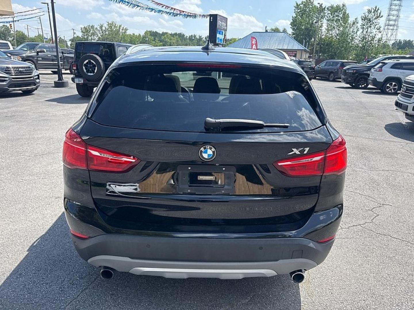 2017 BLACK /BLACK BMW X1 xDrive28i (WBXHT3Z34H4) with an 2.0L L4 DOHC 16V engine, 8A transmission, located at 3304 Woodville Road, Northwood, OH, 43619, (419) 210-8019, 41.612694, -83.480743 - Your #1 Destination for Auto Loans and mdash;No Matter Your Credit!At our dealership, we believe everyone deserves the opportunity to drive their dream car and mdash;whether you have good credit, bad credit, or no credit at all. With a wide selection of hundreds of cars, trucks, and SUVs, you'll fin- Photo#3