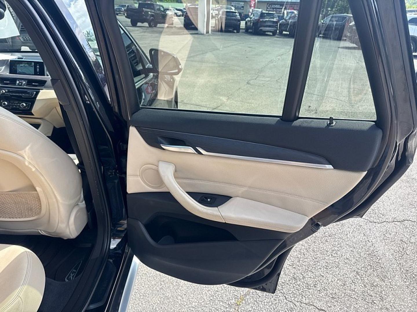2017 BLACK /BLACK BMW X1 xDrive28i (WBXHT3Z34H4) with an 2.0L L4 DOHC 16V engine, 8A transmission, located at 3304 Woodville Road, Northwood, OH, 43619, (419) 210-8019, 41.612694, -83.480743 - Your #1 Destination for Auto Loans and mdash;No Matter Your Credit!At our dealership, we believe everyone deserves the opportunity to drive their dream car and mdash;whether you have good credit, bad credit, or no credit at all. With a wide selection of hundreds of cars, trucks, and SUVs, you'll fin- Photo#13