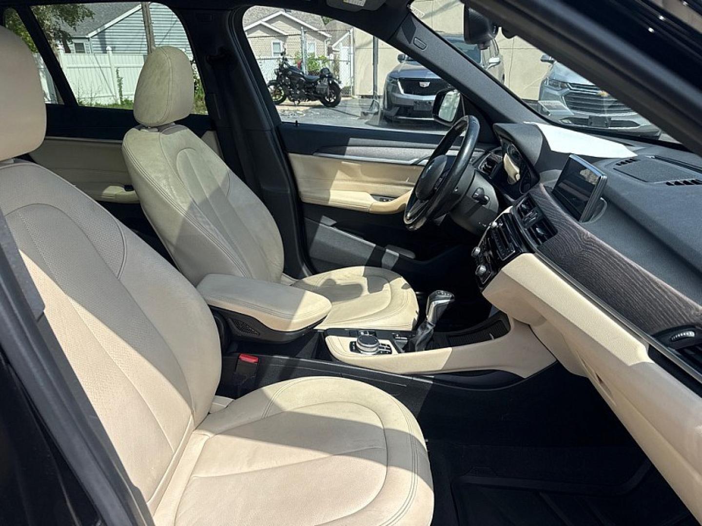 2017 BLACK /BLACK BMW X1 xDrive28i (WBXHT3Z34H4) with an 2.0L L4 DOHC 16V engine, 8A transmission, located at 3304 Woodville Road, Northwood, OH, 43619, (419) 210-8019, 41.612694, -83.480743 - Your #1 Destination for Auto Loans and mdash;No Matter Your Credit!At our dealership, we believe everyone deserves the opportunity to drive their dream car and mdash;whether you have good credit, bad credit, or no credit at all. With a wide selection of hundreds of cars, trucks, and SUVs, you'll fin- Photo#16