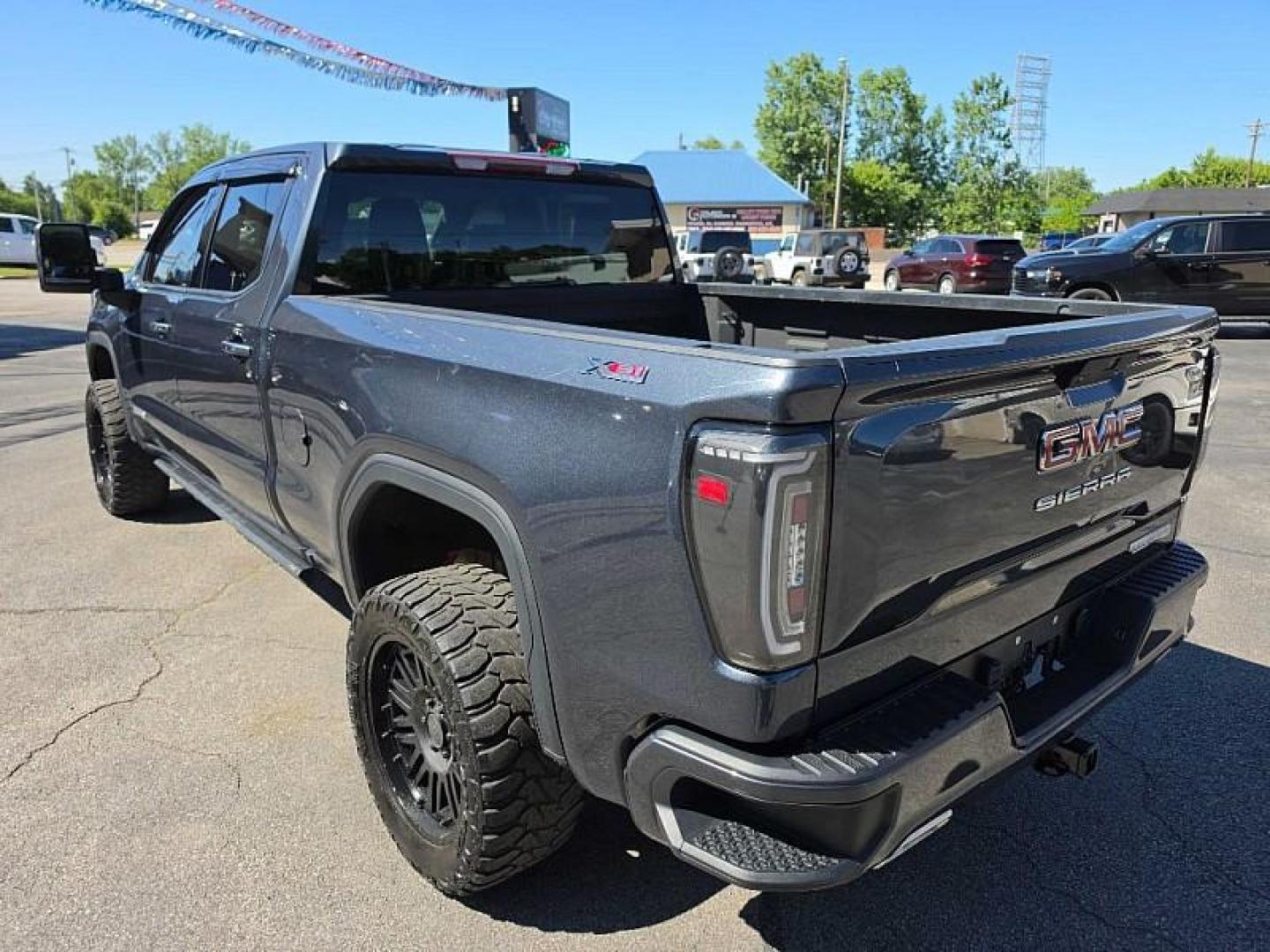 2021 GRAY /BLACK GMC Sierra 1500 Elevation Crew Cab Short Box 4WD (1GTU9CET3MZ) with an 3.0L L6 DOHC 24V DIESEL engine, 6A transmission, located at 3304 Woodville Road, Northwood, OH, 43619, (419) 210-8019, 41.612694, -83.480743 - Your #1 Destination for Auto Loans and mdash;No Matter Your Credit!At our dealership, we believe everyone deserves the opportunity to drive their dream car and mdash;whether you have good credit, bad credit, or no credit at all. With a wide selection of hundreds of cars, trucks, and SUVs, you'll fin- Photo#2