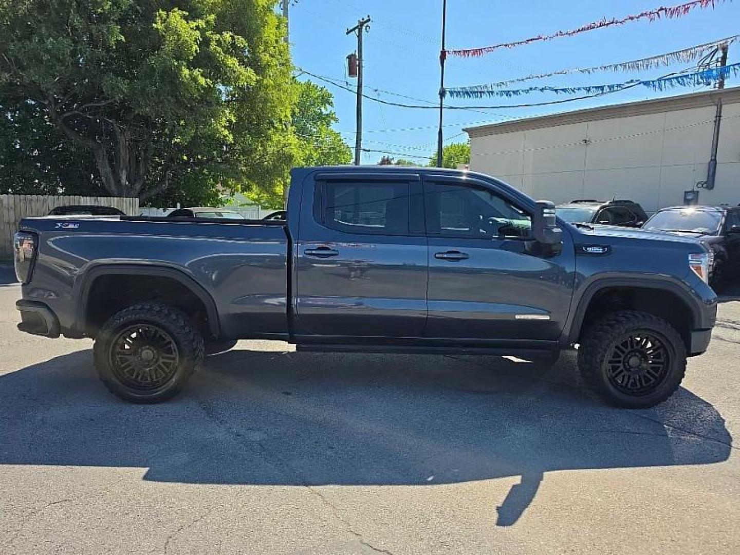 2021 GRAY /BLACK GMC Sierra 1500 Elevation Crew Cab Short Box 4WD (1GTU9CET3MZ) with an 3.0L L6 DOHC 24V DIESEL engine, 6A transmission, located at 3304 Woodville Road, Northwood, OH, 43619, (419) 210-8019, 41.612694, -83.480743 - Your #1 Destination for Auto Loans and mdash;No Matter Your Credit!At our dealership, we believe everyone deserves the opportunity to drive their dream car and mdash;whether you have good credit, bad credit, or no credit at all. With a wide selection of hundreds of cars, trucks, and SUVs, you'll fin- Photo#5