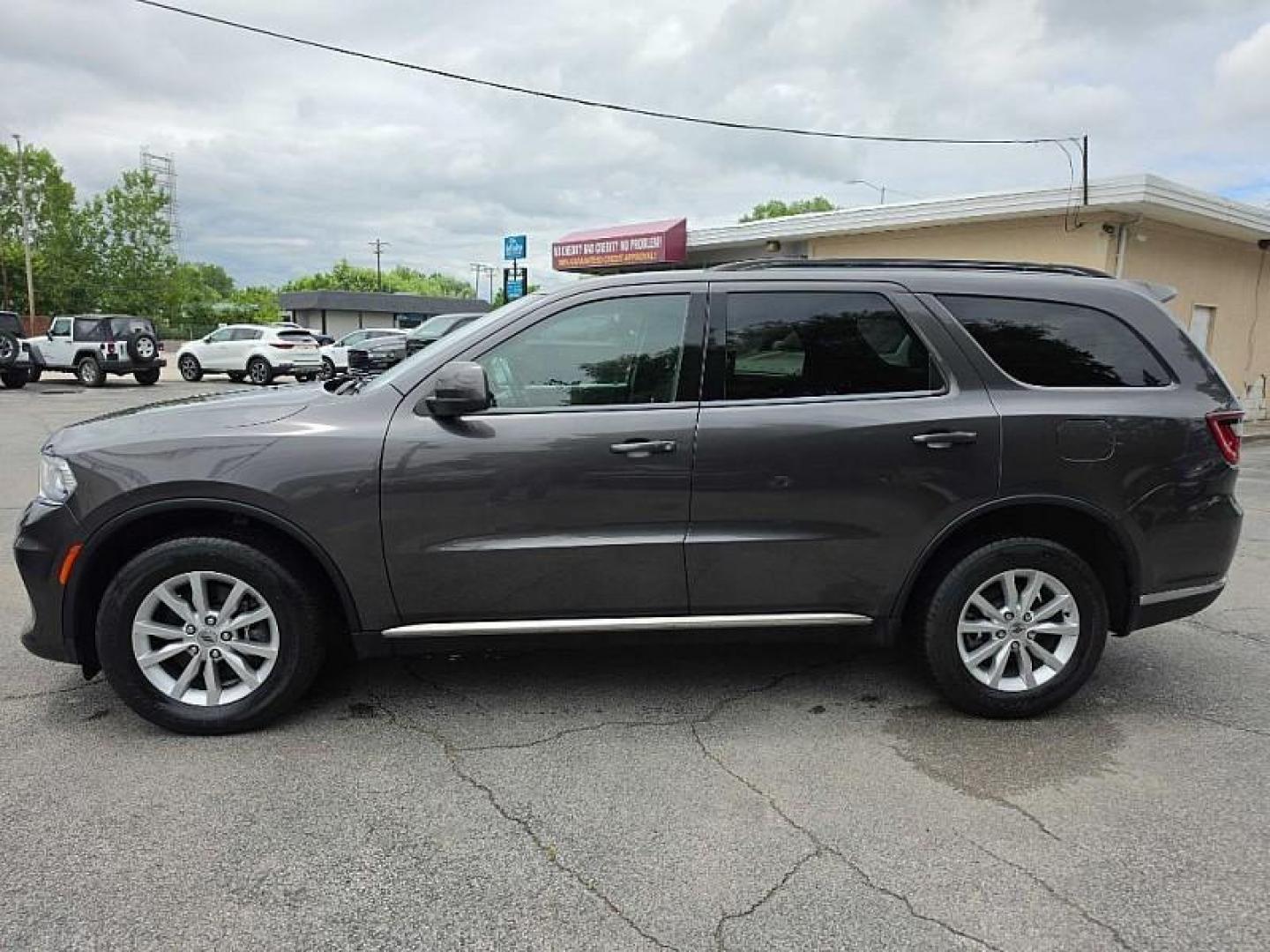 2021 GRAY /BLACK Dodge Durango SXT AWD (1C4RDJAG2MC) with an 3.6L V6 DOHC 24V engine, 8A transmission, located at 3304 Woodville Road, Northwood, OH, 43619, (419) 210-8019, 41.612694, -83.480743 - Your #1 Destination for Auto Loans and mdash;No Matter Your Credit!At our dealership, we believe everyone deserves the opportunity to drive their dream car and mdash;whether you have good credit, bad credit, or no credit at all. With a wide selection of hundreds of cars, trucks, and SUVs, you'll fin- Photo#1