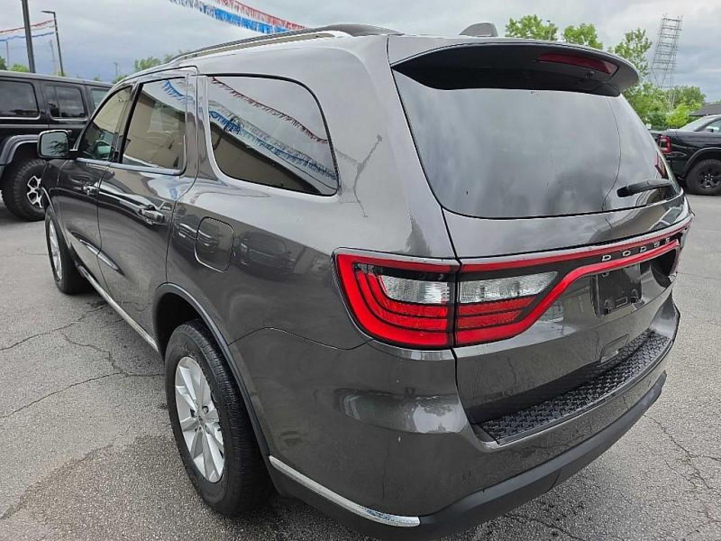 2021 GRAY /BLACK Dodge Durango SXT AWD (1C4RDJAG2MC) with an 3.6L V6 DOHC 24V engine, 8A transmission, located at 3304 Woodville Road, Northwood, OH, 43619, (419) 210-8019, 41.612694, -83.480743 - Your #1 Destination for Auto Loans and mdash;No Matter Your Credit!At our dealership, we believe everyone deserves the opportunity to drive their dream car and mdash;whether you have good credit, bad credit, or no credit at all. With a wide selection of hundreds of cars, trucks, and SUVs, you'll fin- Photo#2