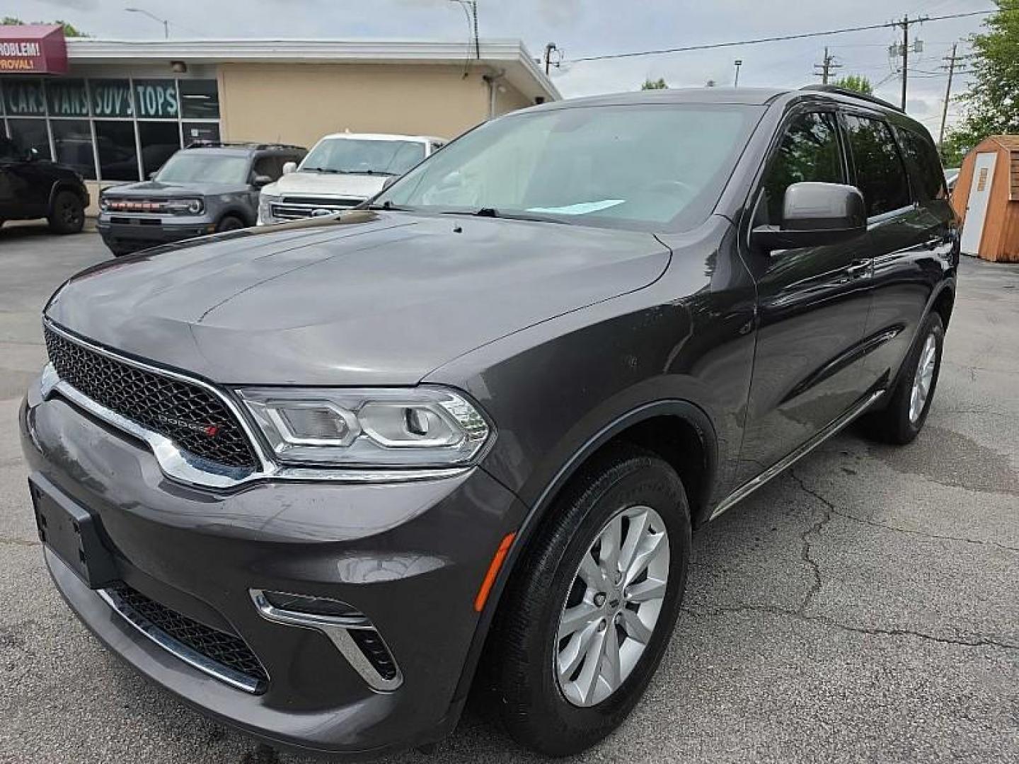 2021 GRAY /BLACK Dodge Durango SXT AWD (1C4RDJAG2MC) with an 3.6L V6 DOHC 24V engine, 8A transmission, located at 3304 Woodville Road, Northwood, OH, 43619, (419) 210-8019, 41.612694, -83.480743 - Your #1 Destination for Auto Loans and mdash;No Matter Your Credit!At our dealership, we believe everyone deserves the opportunity to drive their dream car and mdash;whether you have good credit, bad credit, or no credit at all. With a wide selection of hundreds of cars, trucks, and SUVs, you'll fin- Photo#0