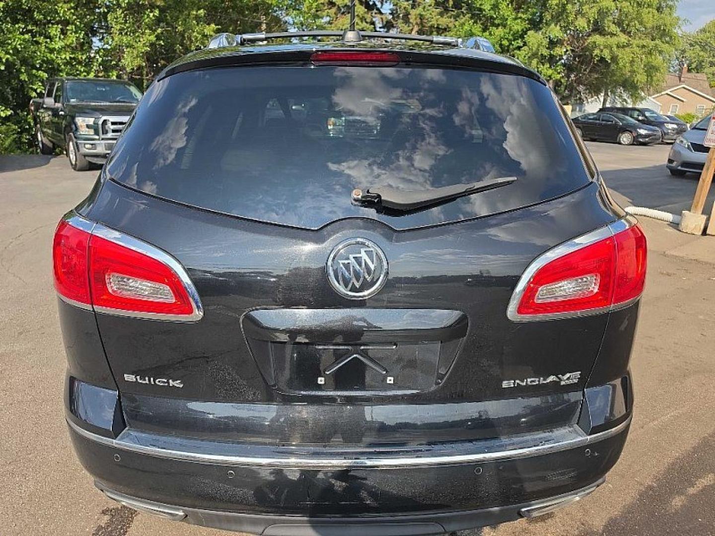2016 BLACK /BLACK Buick Enclave Premium AWD (5GAKVCKD9GJ) with an 3.6L V6 DOHC 24V engine, 6A transmission, located at 3304 Woodville Road, Northwood, OH, 43619, (419) 210-8019, 41.612694, -83.480743 - Your #1 Destination for Auto Loans and mdash;No Matter Your Credit!At our dealership, we believe everyone deserves the opportunity to drive their dream car and mdash;whether you have good credit, bad credit, or no credit at all. With a wide selection of hundreds of cars, trucks, and SUVs, you'll fin- Photo#3