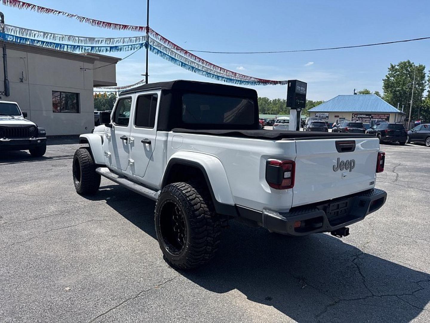 2020 WHITE /BLACK Jeep Gladiator Overland (1C6HJTFG7LL) with an 3.6L V6 DOHC 24V engine, 6M transmission, located at 3304 Woodville Road, Northwood, OH, 43619, (419) 210-8019, 41.612694, -83.480743 - Your #1 Destination for Auto Loans and mdash;No Matter Your Credit!At our dealership, we believe everyone deserves the opportunity to drive their dream car and mdash;whether you have good credit, bad credit, or no credit at all. With a wide selection of hundreds of cars, trucks, and SUVs, you'll fin- Photo#2