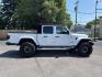 2020 WHITE /BLACK Jeep Gladiator Overland (1C6HJTFG7LL) with an 3.6L V6 DOHC 24V engine, 6M transmission, located at 3304 Woodville Road, Northwood, OH, 43619, (419) 210-8019, 41.612694, -83.480743 - Your #1 Destination for Auto Loans and mdash;No Matter Your Credit!At our dealership, we believe everyone deserves the opportunity to drive their dream car and mdash;whether you have good credit, bad credit, or no credit at all. With a wide selection of hundreds of cars, trucks, and SUVs, you'll fin- Photo#5