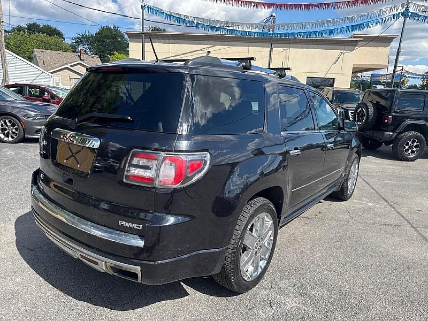 2015 BLACK /BLACK GMC Acadia Denali AWD (1GKKVTKD9FJ) with an 3.6L V6 DOHC 24V engine, 6-Speed Automatic transmission, located at 3304 Woodville Road, Northwood, OH, 43619, (419) 210-8019, 41.612694, -83.480743 - Your #1 Destination for Auto Loans and mdash;No Matter Your Credit!At our dealership, we believe everyone deserves the opportunity to drive their dream car and mdash;whether you have good credit, bad credit, or no credit at all. With a wide selection of hundreds of cars, trucks, and SUVs, you'll fin - Photo#4