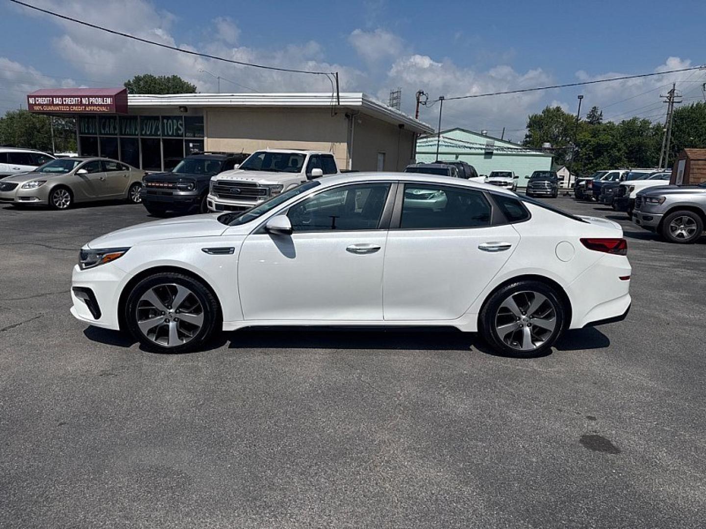 2020 WHITE /BLACK Kia Optima LX (5XXGT4L3XLG) with an 2.4L L4 DOHC 16V engine, 6A transmission, located at 3304 Woodville Road, Northwood, OH, 43619, (419) 210-8019, 41.612694, -83.480743 - Your #1 Destination for Auto Loans and mdash;No Matter Your Credit!At our dealership, we believe everyone deserves the opportunity to drive their dream car and mdash;whether you have good credit, bad credit, or no credit at all. With a wide selection of hundreds of cars, trucks, and SUVs, you'll fin- Photo#1